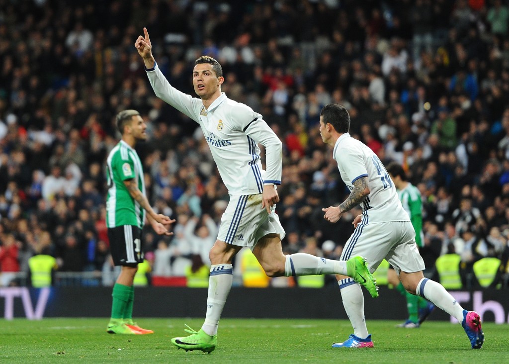 MADRID, SPAIN - MARCH 12: Cristiano Ronaldo of Real Madrid celebrates after scoring Real's opening goal during the La Liga match between Real Madrid CF and Real Betis Balompie at Estadio Santiago Bernabeu on March 12, 2017 in Madrid, Spain. (Photo by Denis Doyle/Getty Images)