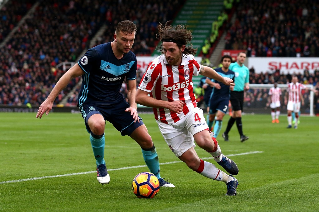STOKE ON TRENT, ENGLAND - MARCH 04: Joe Allen of Stoke City battles with Ben Gibson of Middlesbrough during the Premier League match between Stoke City and Middlesbrough at Bet365 Stadium on March 4, 2017 in Stoke on Trent, England. (Photo by Jan Kruger/Getty Images)