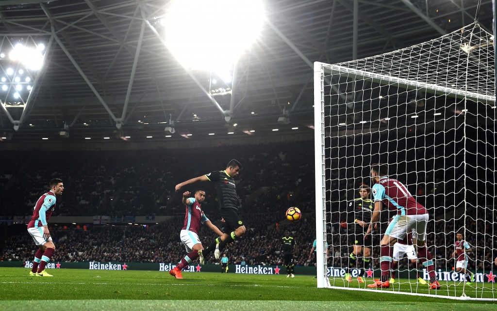 STRATFORD, ENGLAND - MARCH 06: Diego Costa of Chelsea scores his sides second goal during the Premier League match between West Ham United and Chelsea at London Stadium on March 6, 2017 in Stratford, England. (Photo by Michael Regan/Getty Images)