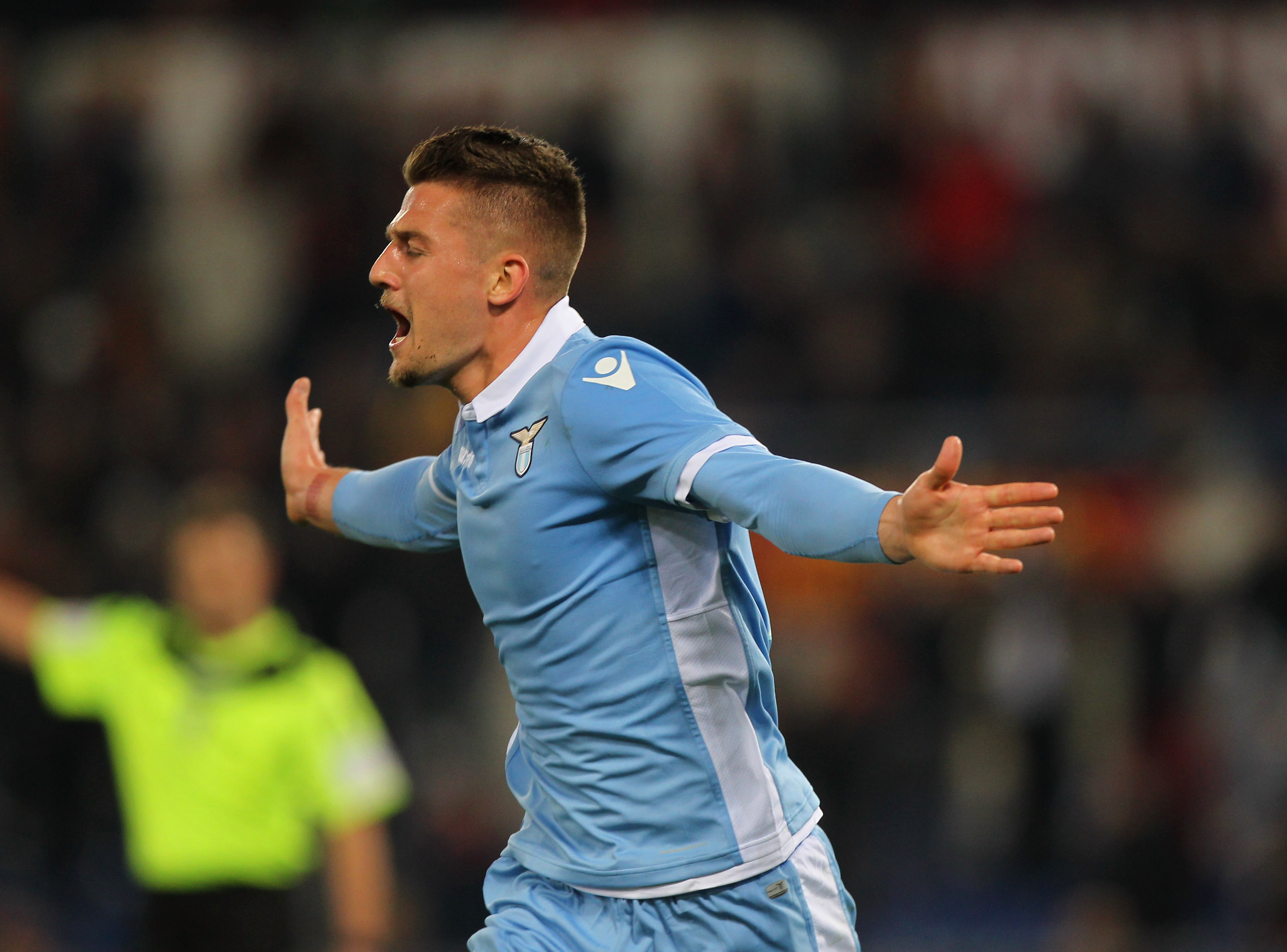 ROME, ITALY - APRIL 04: Sergej Milinkovic of SS Lazio celebrates after scoring the opening goal during the TIM Cup match between AS Roma and SS Lazio at Stadio Olimpico on April 4, 2017 in Rome, Italy. (Photo by Paolo Bruno/Getty Images)