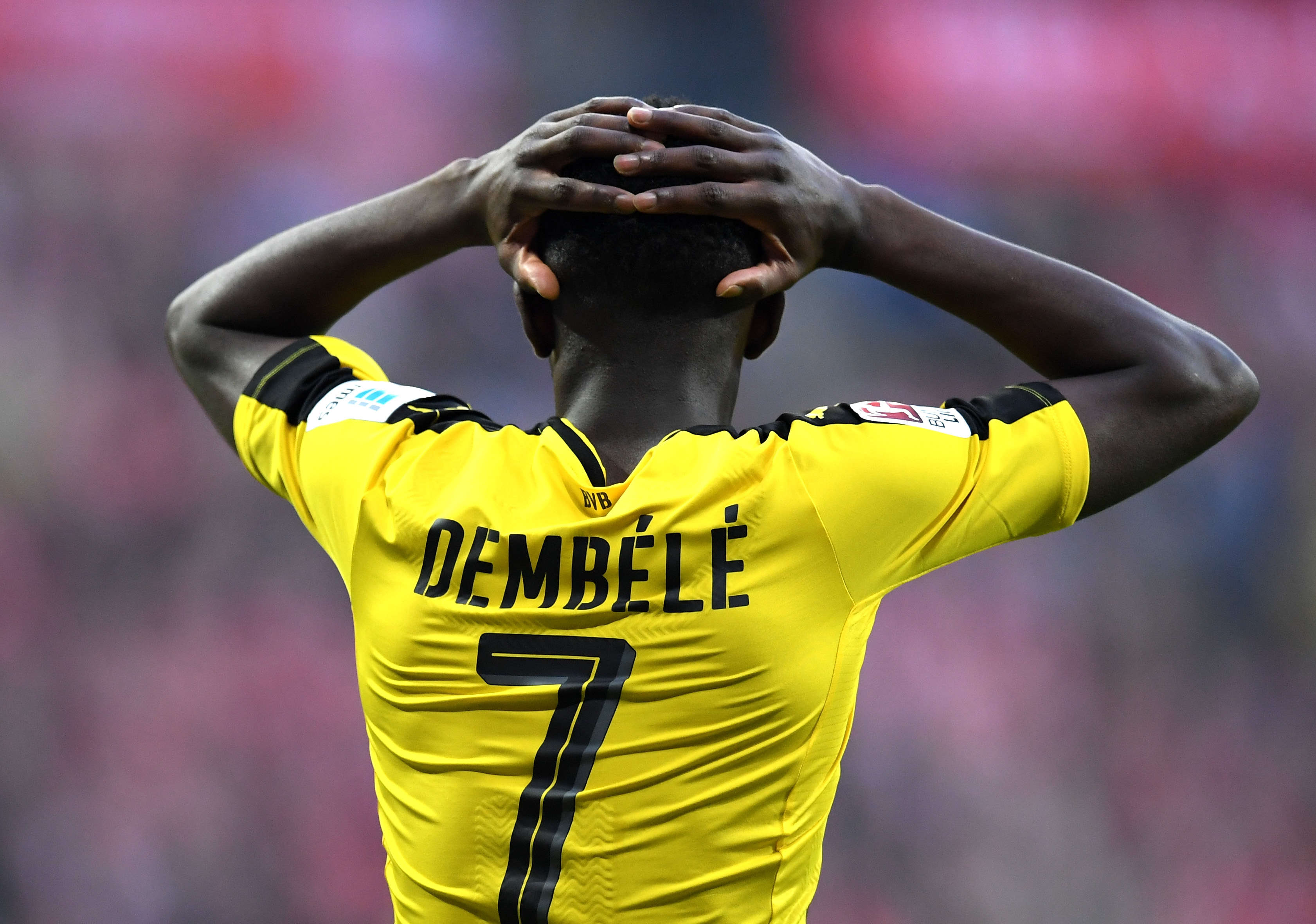 MUNICH, GERMANY - APRIL 08: Ousmane Dembele of Borussia Dortmund reacts during the Bundesliga match between Bayern Muenchen and Borussia Dortmund at Allianz Arena on April 8, 2017 in Munich, Germany. (Photo by Matthias Hangst/Bongarts/Getty Images)