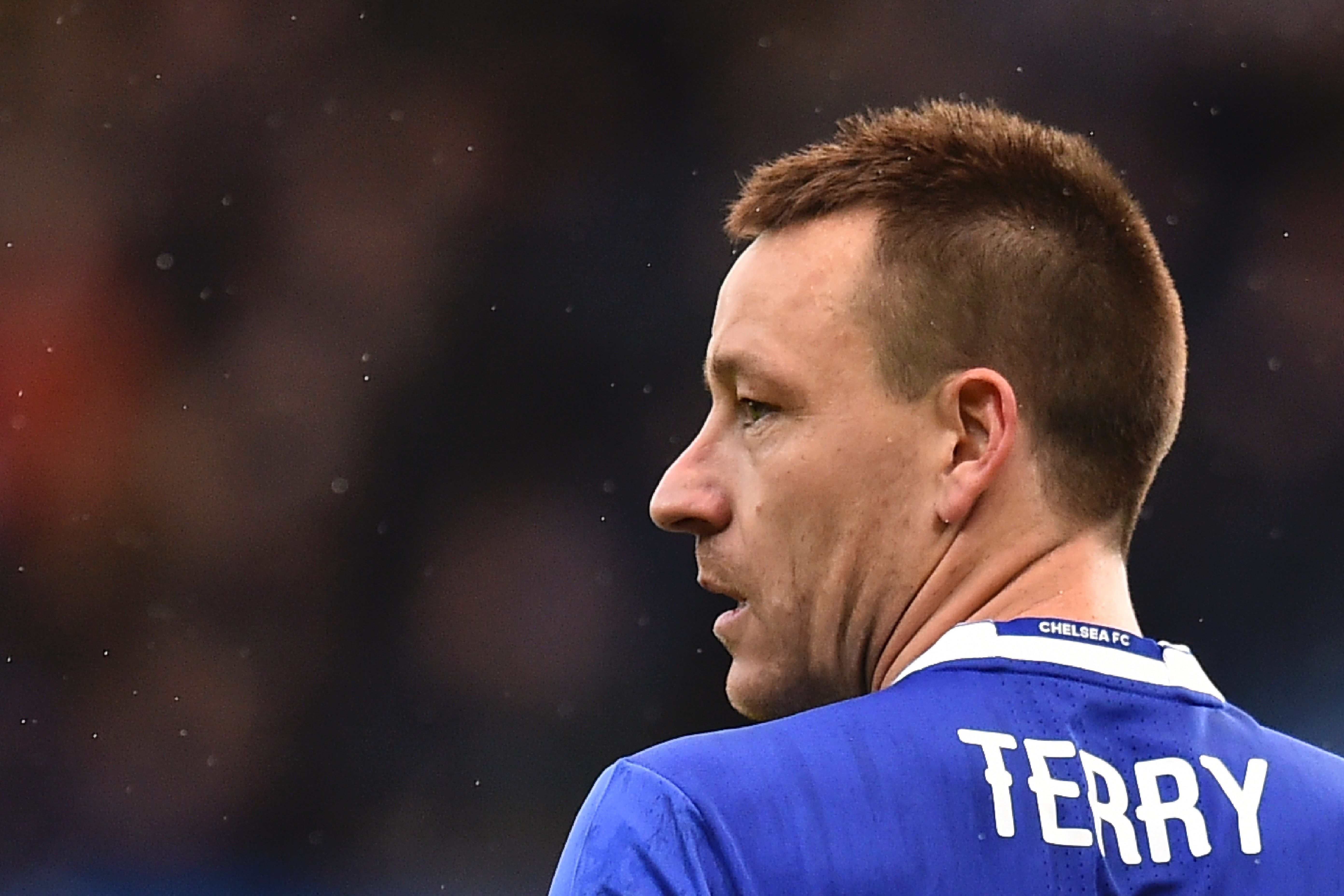 Chelsea's English defender John Terry looks on during the English FA Cup fourth round football match between Chelsea and Brentford at Stamford Bridge in London on January 28, 2017. / AFP / Glyn KIRK / RESTRICTED TO EDITORIAL USE. No use with unauthorized audio, video, data, fixture lists, club/league logos or 'live' services. Online in-match use limited to 75 images, no video emulation. No use in betting, games or single club/league/player publications. / (Photo credit should read GLYN KIRK/AFP/Getty Images)