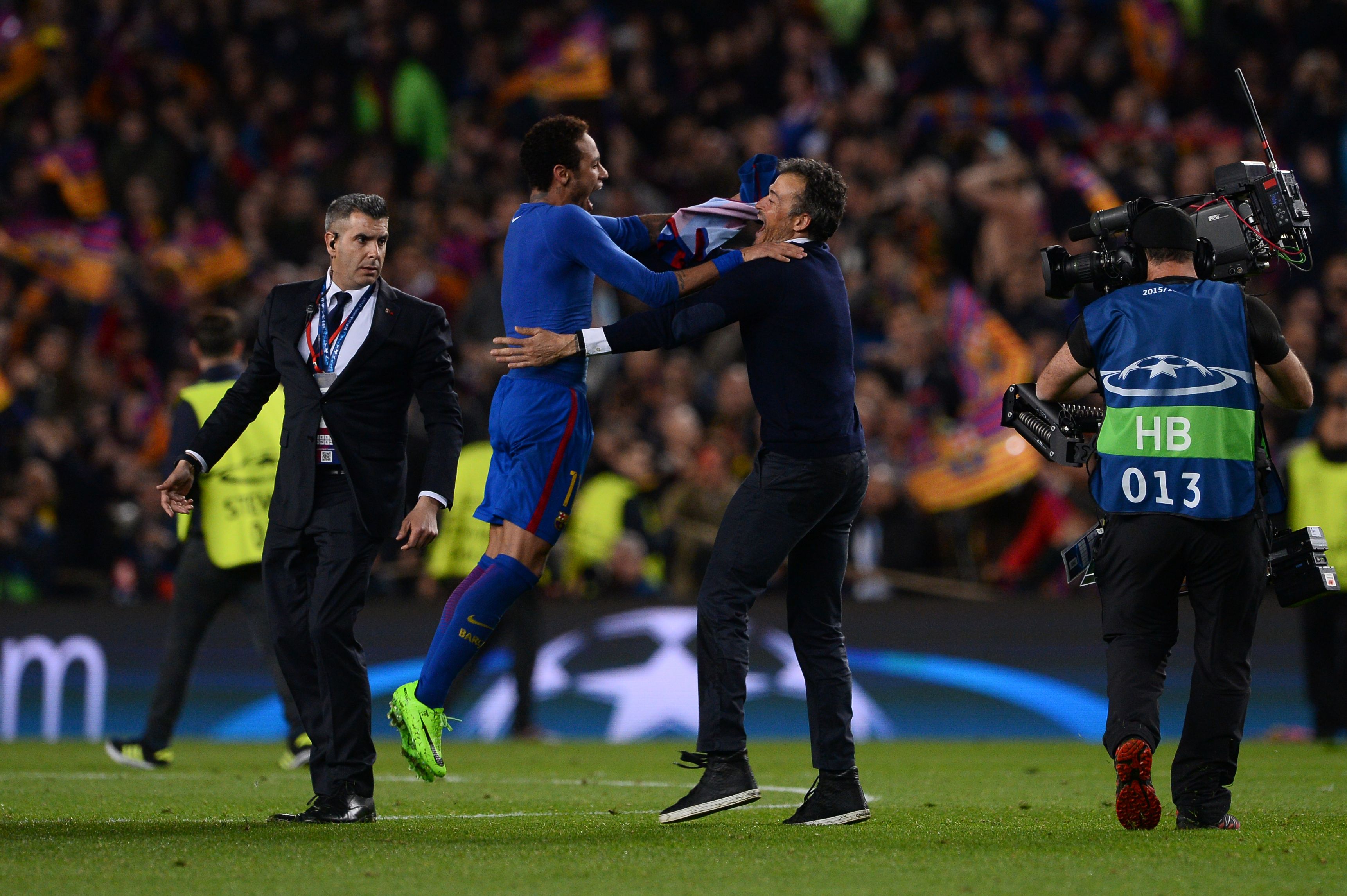 Barcelona's coach Luis Enrique (2ndR) celebrates with Barcelona's Brazilian forward Neymar their 6-1 victory at the end of the UEFA Champions League round of 16 second leg football match FC Barcelona vs Paris Saint-Germain FC at the Camp Nou stadium in Barcelona on March 8, 2017. / AFP PHOTO / Josep Lago (Photo credit should read JOSEP LAGO/AFP/Getty Images)
