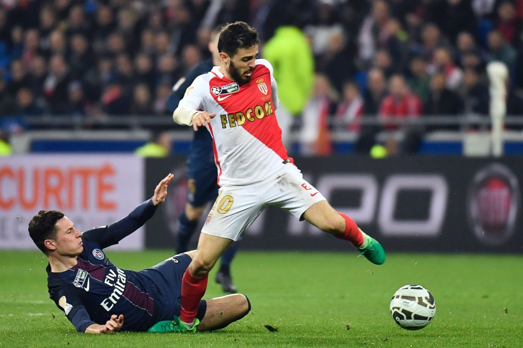 Monaco's Portuguese midfielder Bernardo Silva (R) vies for the ball with Paris Saint-Germain's German forward Julian Draxler during the French League Cup final football match between Paris Saint-Germain (PSG) and Monaco (ASM) on April 1, 2017, at the Parc Olympique Lyonnais stadium in Decines-Charpieu, near Lyon. / AFP PHOTO / Jeff PACHOUD (Photo credit should read JEFF PACHOUD/AFP/Getty Images)