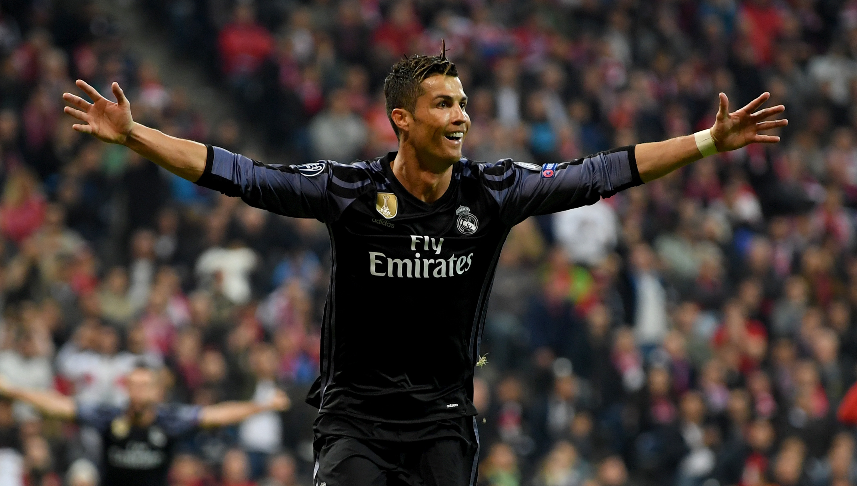 MUNICH, GERMANY - APRIL 12: Cristiano Ronaldo #7 of Real Madrid celebrates after he scores his team's 2nd goal during the UEFA Champions League Quarter Final first leg match between FC Bayern Muenchen and Real Madrid CF at Allianz Arena on April 12, 2017 in Munich, Germany. (Photo by Matthias Hangst/Bongarts/Getty Images)