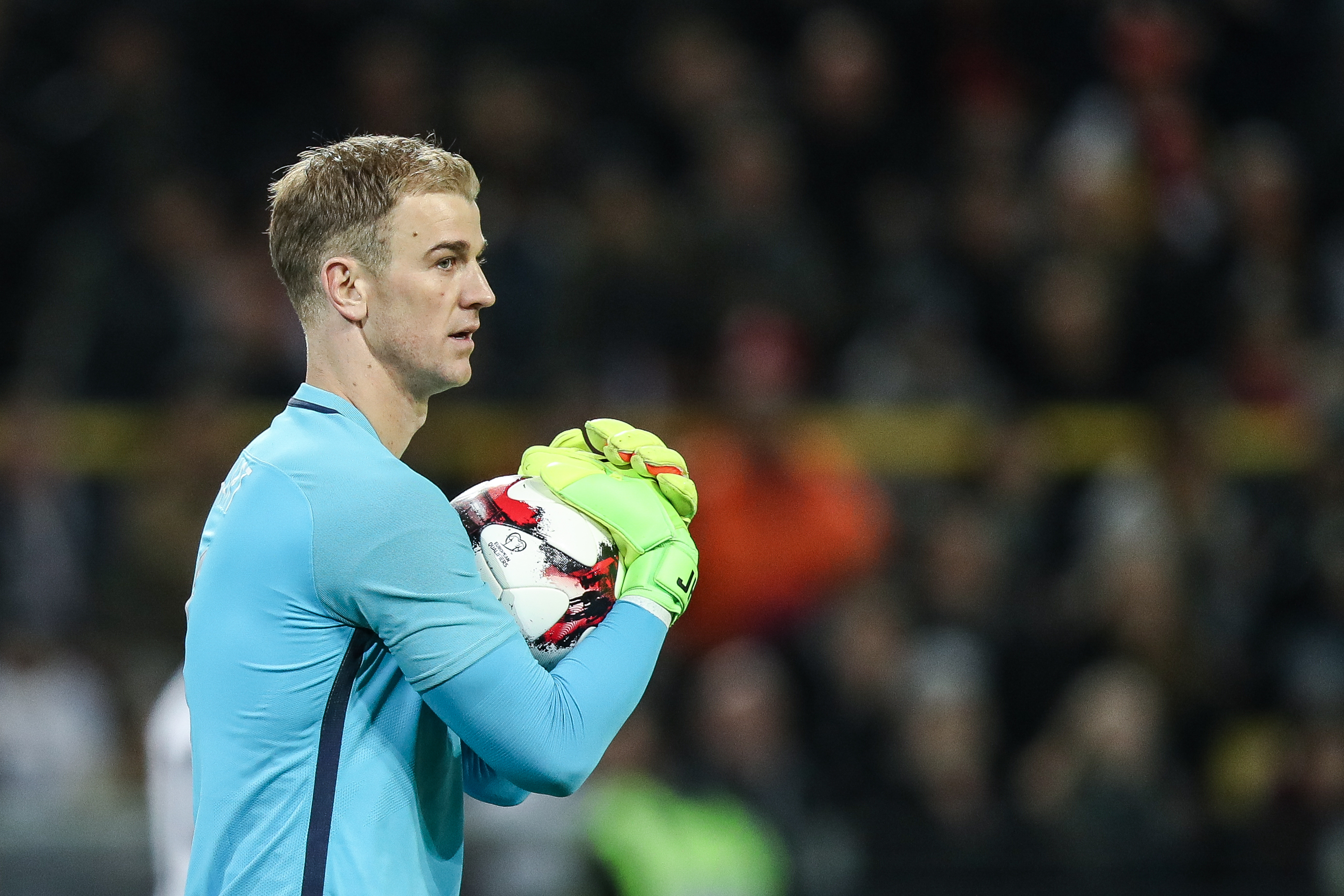 DORTMUND, GERMANY - MARCH 22: Joe Hart goal keeper of England holds the ball during the international friendly match between Germany and England at Signal Iduna Park on March 22, 2017 in Dortmund, Germany. (Photo by Maja Hitij/Bongarts/Getty Images)