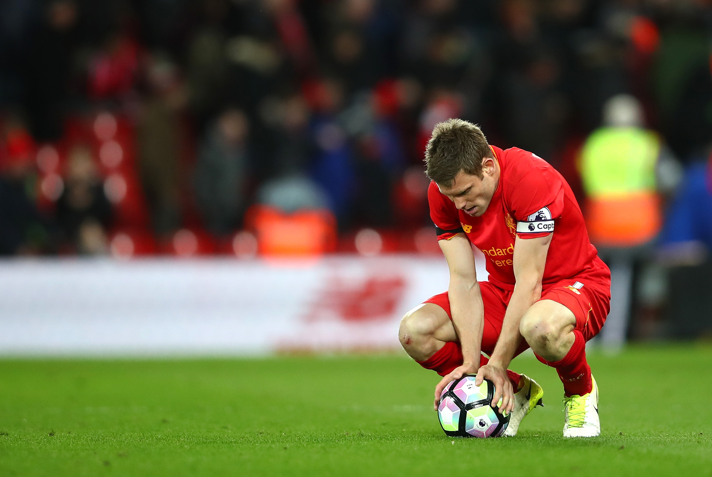 LIVERPOOL, ENGLAND - APRIL 05: James Milner of Liverpool looks dejected after the Premier League match between Liverpool and AFC Bournemouth at Anfield on April 5, 2017 in Liverpool, England. (Photo by Clive Brunskill/Getty Images)