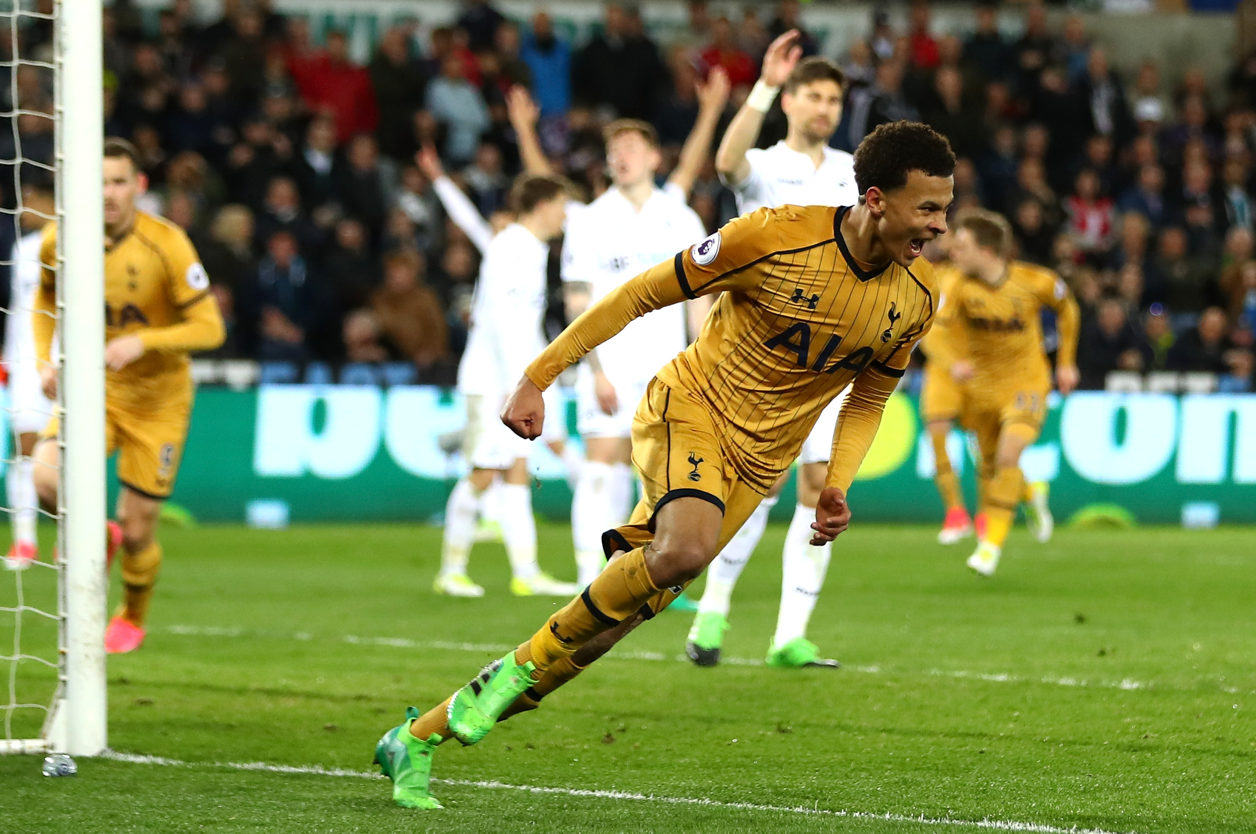 SWANSEA, WALES - APRIL 05: Dele Alli of Tottenham Hotspur celebrates scoring his sides first goal during the Premier League match between Swansea City and Tottenham Hotspur at the Liberty Stadium on April 5, 2017 in Swansea, Wales. (Photo by Michael Steele/Getty Images)
