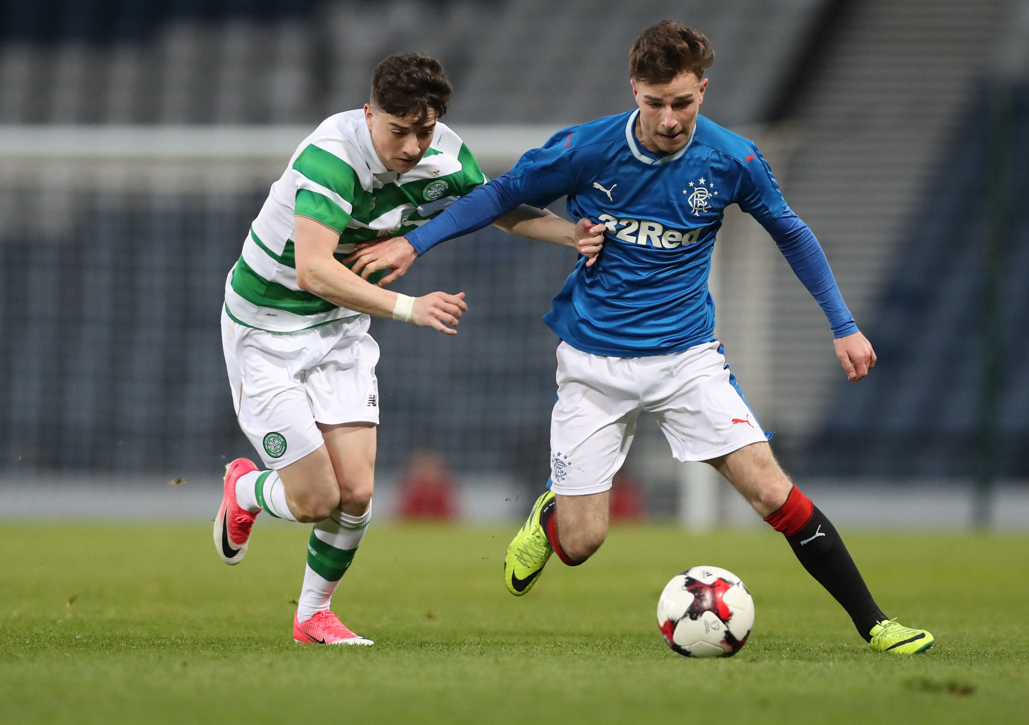 GLASGOW, SCOTLAND - APRIL 26: Michael Johnston of Celtic vies with Josh Jeffries of Rangers during The Scottish FA Youth Cup Final between Celtic and Rangers at Hampden Park on April 26, 2017 in Glasgow, Scotland. (Photo by Ian MacNicol/Getty Images)