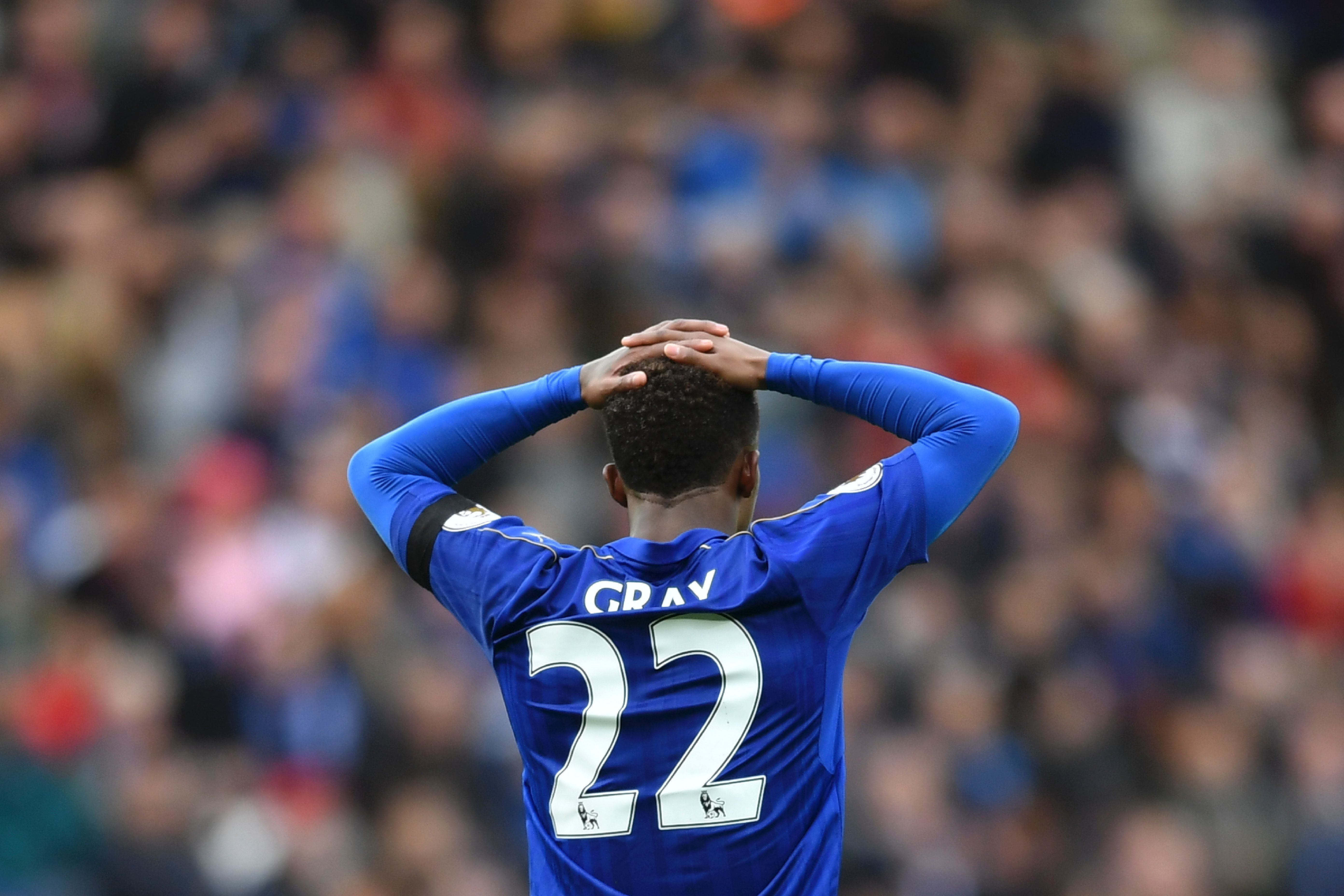 Leicester City's English midfielder Demarai Gray reacts during the English Premier League football match between Leicester City and Stoke City at King Power Stadium in Leicester, central England on April 1, 2017. / AFP PHOTO / Ben STANSALL / RESTRICTED TO EDITORIAL USE. No use with unauthorized audio, video, data, fixture lists, club/league logos or 'live' services. Online in-match use limited to 75 images, no video emulation. No use in betting, games or single club/league/player publications. / (Photo credit should read BEN STANSALL/AFP/Getty Images)