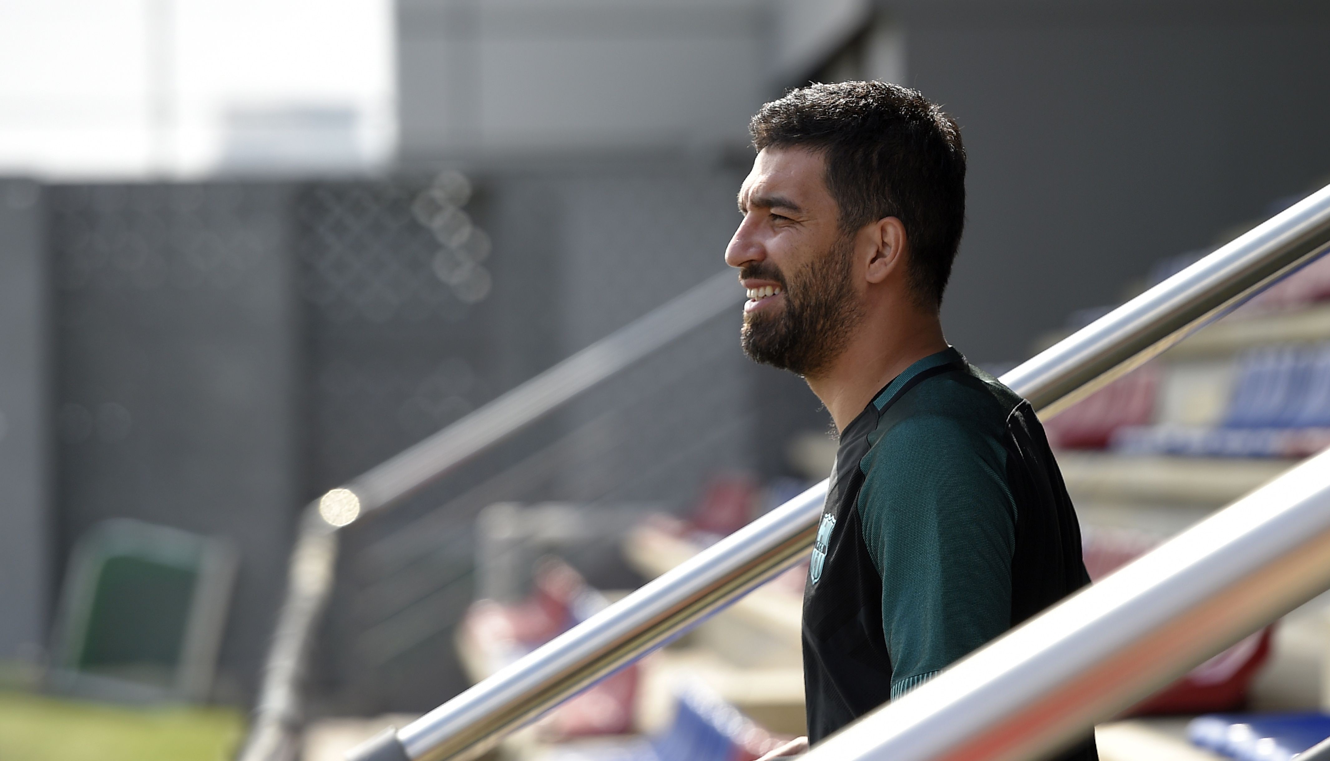 Barcelona's Turkish forward Arda Turan arrives for a training session at the Joan Gamper Sports Center in Sant Joan Despi, near Barcelona, on April 18, 2017 on the eve of the UEFA Champions League quarter-final second leg football match FC Barcelona vs Juventus. / AFP PHOTO / LLUIS GENE (Photo credit should read LLUIS GENE/AFP/Getty Images)
