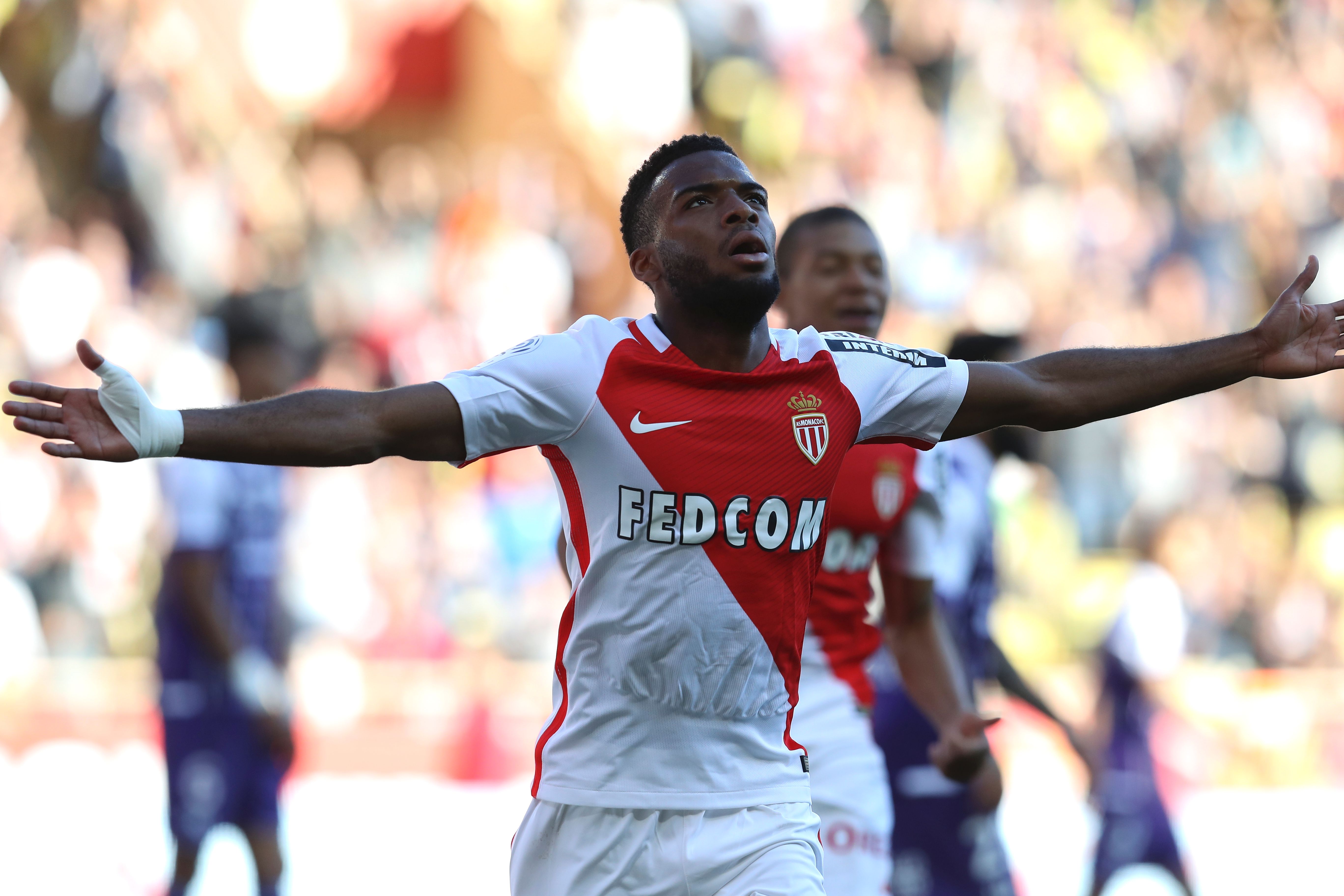 Monaco's French midfielder Thomas Lemar celebrates after scoring a goal during the French L1 football match Monaco (ASM) vs Toulouse (TFC) on April 29, 2017 at the "Louis II Stadium" in Monaco. / AFP PHOTO / VALERY HACHE (Photo credit should read VALERY HACHE/AFP/Getty Images)