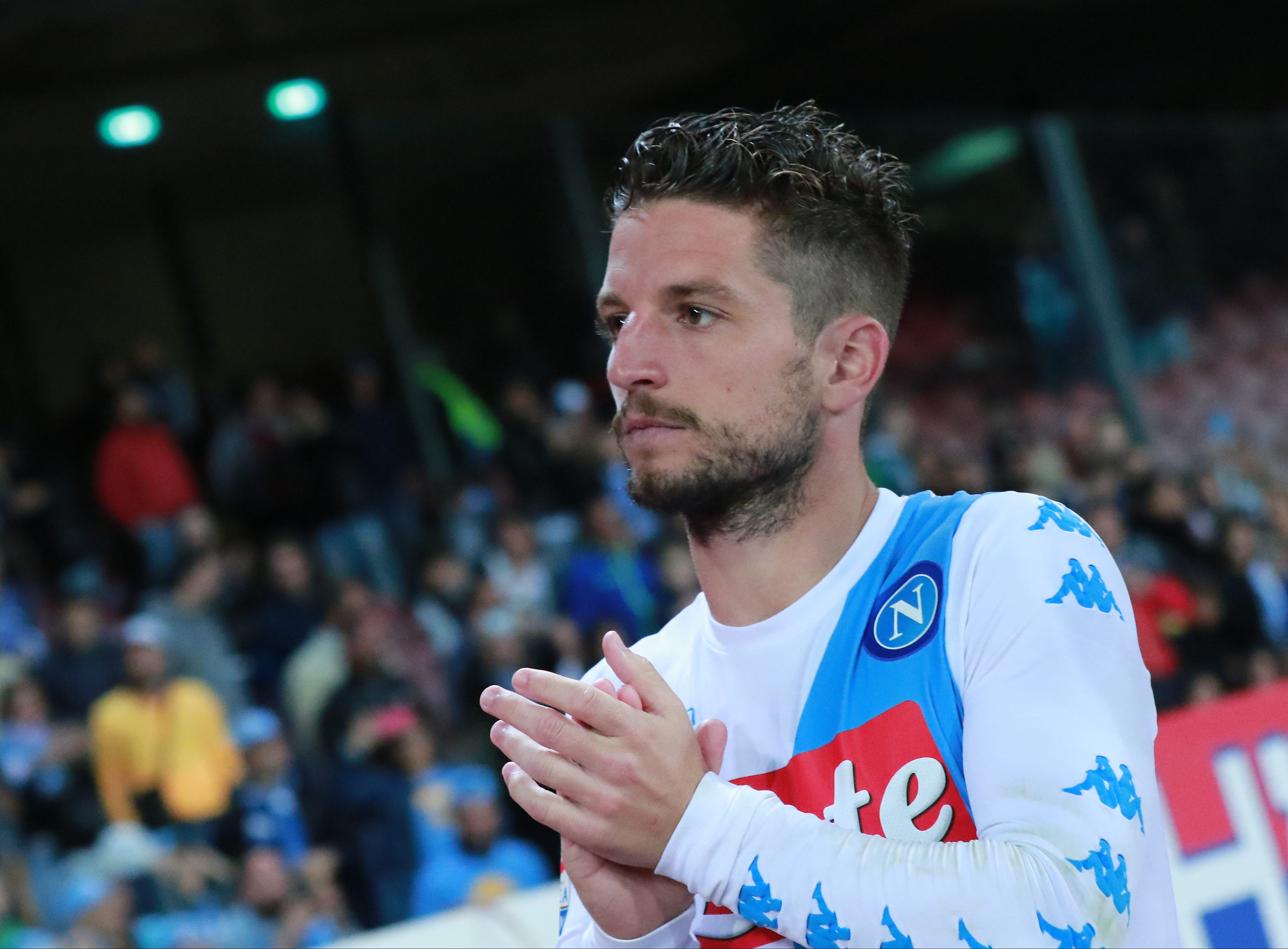 Napoli's Belgian forward Dries Mertens greets the fans at the end of the Italian Serie A football match SSC Napoli vs Fiorentina ACF on May 20, 2017 at the San Paolo Stadium in Naples. / AFP PHOTO / CARLO HERMANN (Photo credit should read CARLO HERMANN/AFP/Getty Images)