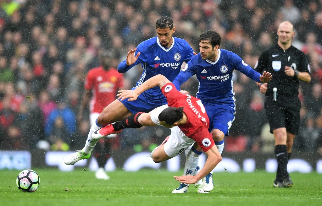Could Fabregas be putting the red of Manchester United next season? (Photo courtesy - Michael Regan/Getty Images)