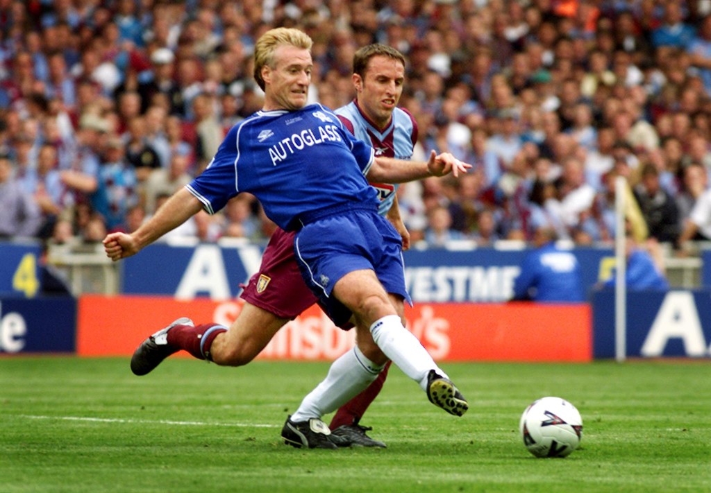 Set to renew their rivalry on the touchline. (Photo courtesy - Adrian Dennis/AFP/Getty Images)