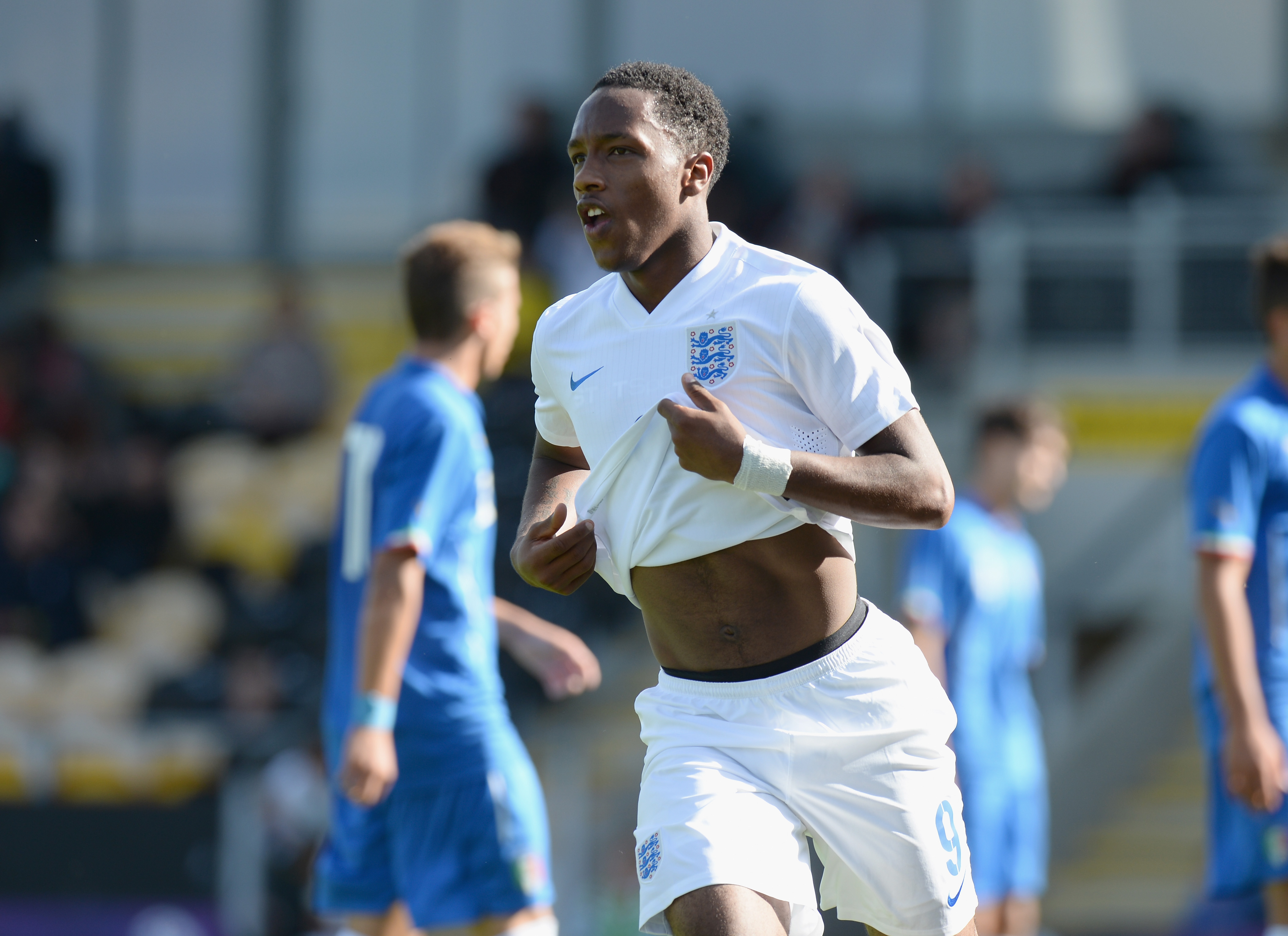 BURTON-UPON-TRENT, ENGLAND - AUGUST 31:  Kaylen Hinds of England celebrates scoring their fourth goal during the International match betweeen Engand Under 17 and Italy Under17 at Pirelli Stadium on August 31, 2014 in Burton-upon-Trent, England.  (Photo by Tony Marshall/Getty Images)
