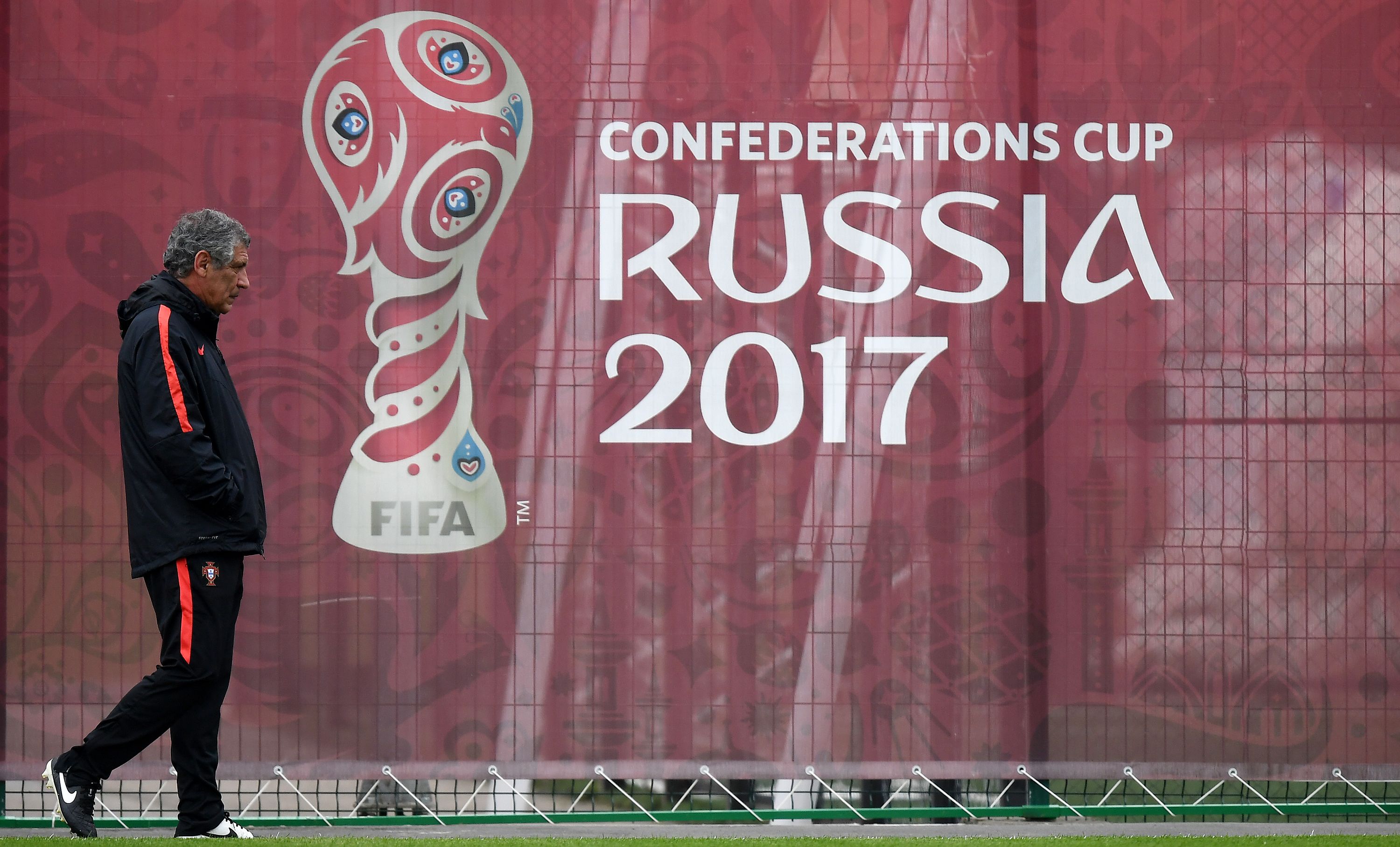Portugal's head coach Fernando Santos walks during a training session in Kazan, Russia, on June 27, 2017 on the eve of the Russia 2017 FIFA Confederations Cup football semi-final match Portugal vs Chile. / AFP PHOTO / FRANCK FIFE (Photo credit should read FRANCK FIFE/AFP/Getty Images)