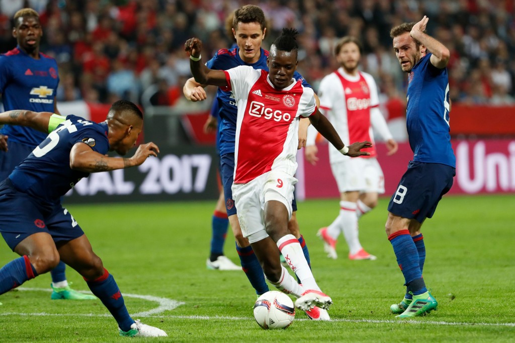 Ajax Burkinabe forward Bertrand Traoré (C) gets past Manchester United's Spanish midfielder Juan Mata (R) and Manchester United's Spanish midfielder Ander Herrera during the UEFA Europa League final football match Ajax Amsterdam v Manchester United on May 24, 2017 at the Friends Arena in Solna outside Stockholm. / AFP PHOTO / Odd ANDERSEN (Photo credit should read ODD ANDERSEN/AFP/Getty Images)