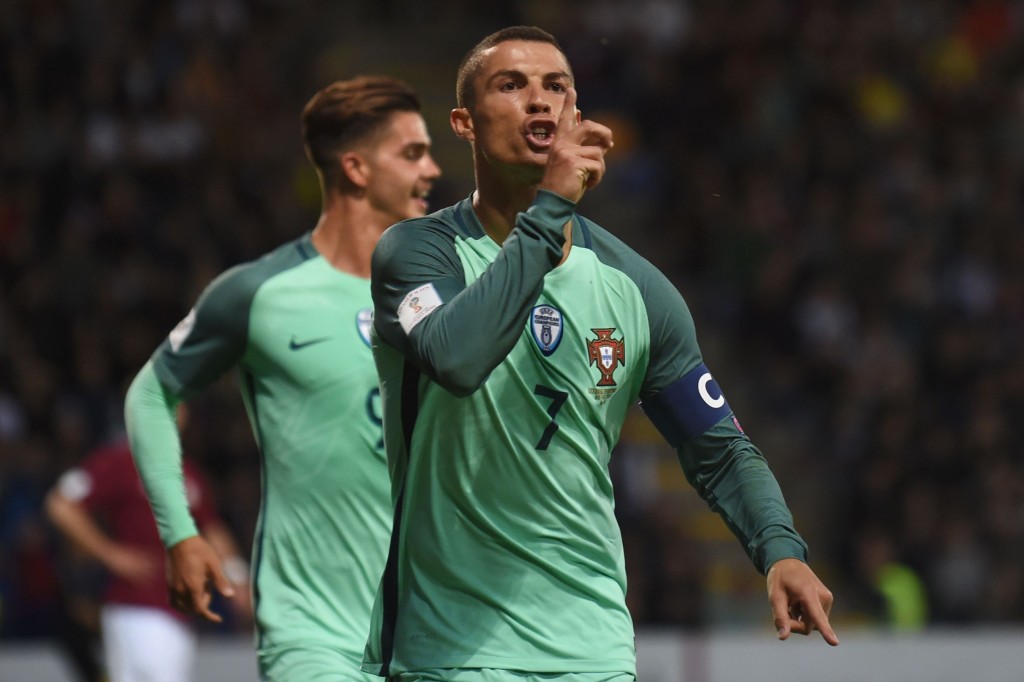 Portugal's forward Cristiano Ronaldo (R) gestures during the FIFA World Cup 2018 qualification football match between Latvia and Portugal in Riga, on June 9, 2017. / AFP PHOTO / Janek SKARZYNSKI (Photo credit should read JANEK SKARZYNSKI/AFP/Getty Images)