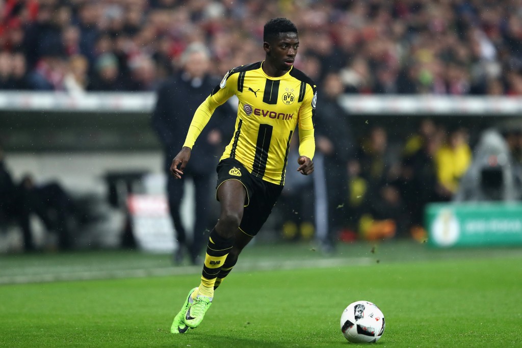 MUNICH, GERMANY - APRIL 26: Ousmane Dembele of Dortmund runs with the ball during the DFB Cup semi final match between FC Bayern Muenchen and Borussia Dortmund at Allianz Arena on April 26, 2017 in Munich, Germany. (Photo by Alexander Hassenstein/Bongarts/Getty Images)