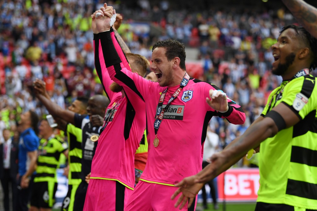 LONDON, ENGLAND - MAY 29: Danny Ward of Huddersfield Town celebrates promotion to the Premier League with his Huddersield Town team mates after the Sky Bet Championship play off final between Huddersfield and Reading at Wembley Stadium on May 29, 2017 in London, England. (Photo by Gareth Copley/Getty Images)