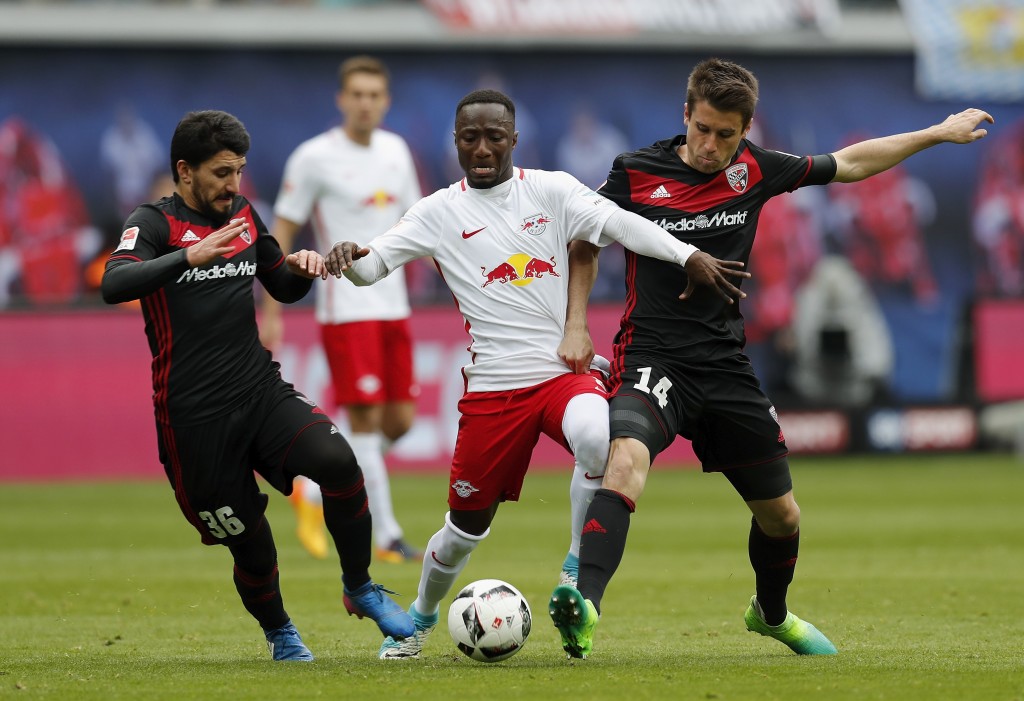 LEIPZIG, GERMANY - APRIL 29: Naby Keita of RB Leipzig is challenged by Almog Cohen and Stefan Lex of FC Ingolstadt 04 during the Bundesliga match between RB Leipzig and FC Ingolstadt 04 at Red Bull Arena on April 29, 2017 in Leipzig, Germany. (Photo by Boris Streubel/Bongarts/Getty Images)