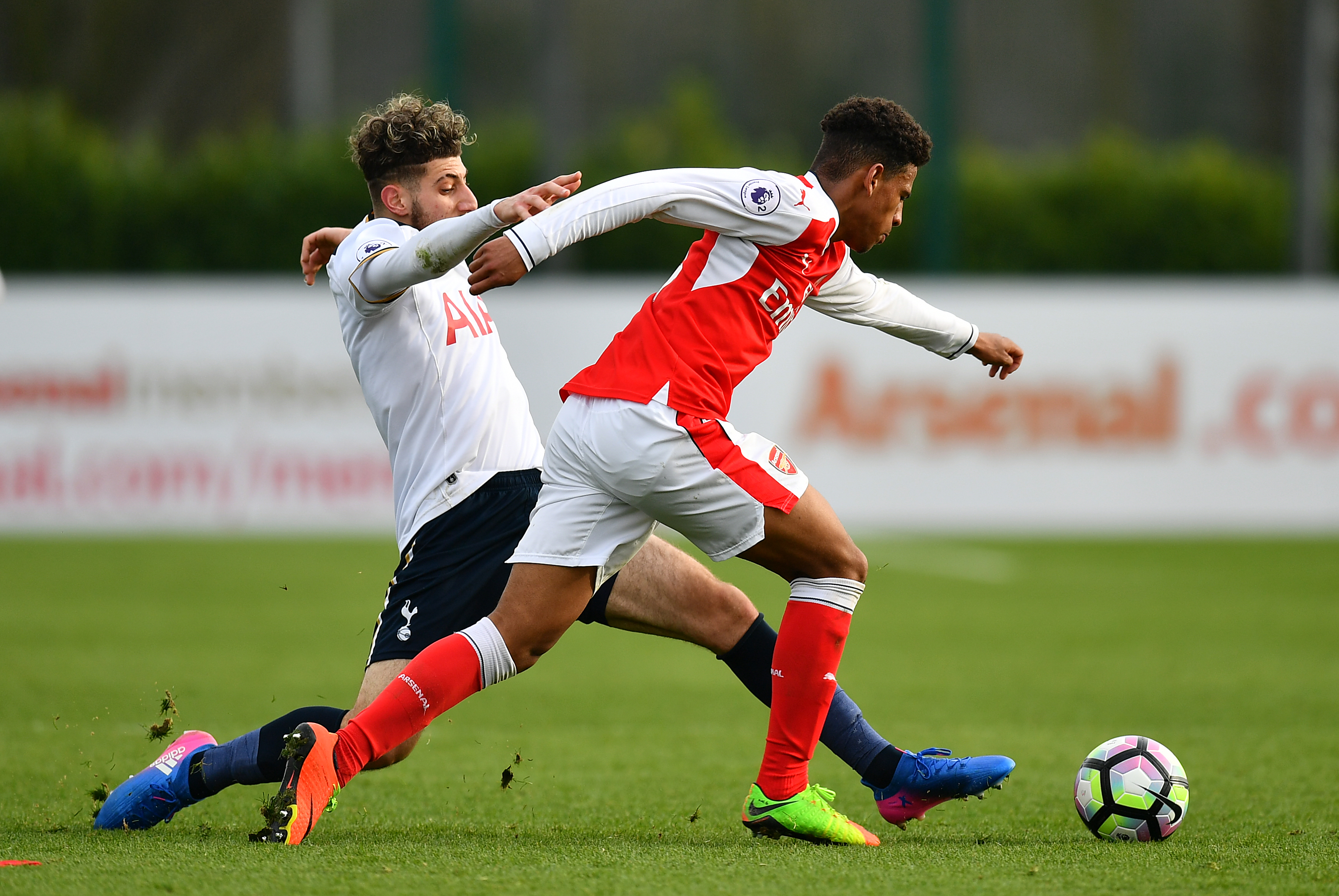 ST ALBANS, ENGLAND - MARCH 03: Marcus McGuane of Arsenal is tackled by Zenon Stylianides of Tottenham Hotspur during the Premier League 2 match between Arsenal and Tottenham Hotspur at London Colney on March 3, 2017 in St Albans, England. (Photo by Dan Mullan/Getty Images)