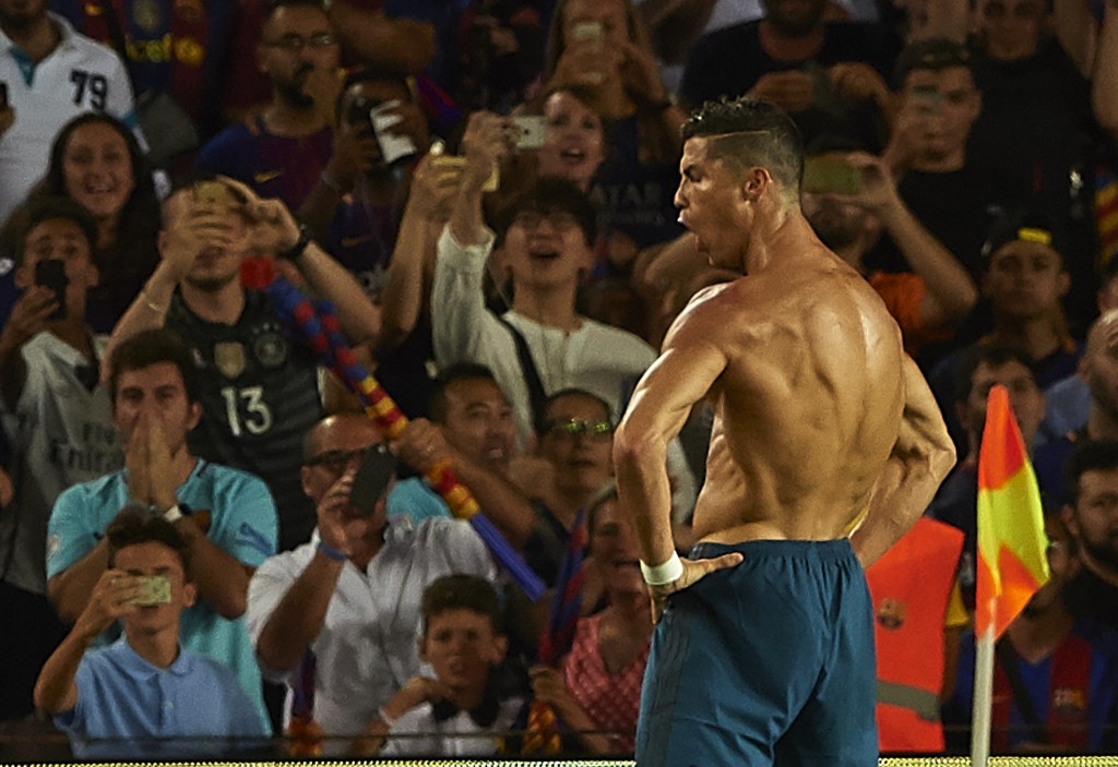 BARCELONA, SPAIN - AUGUST 13: Cristiano Ronaldo of Real Madrid celebrates scoring his team's second goal during the Supercopa de Espana Supercopa Final 1st Leg match between FC Barcelona and Real Madrid at Camp Nou on August 13, 2017 in Barcelona, Spain. (Photo by Manuel Queimadelos Alonso/Getty Images,)
