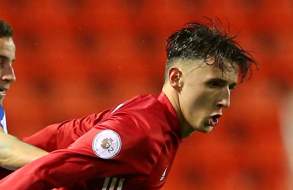 LEIGH, GREATER MANCHESTER - FEBRUARY 22: Callum Whelan of Manchester United holds off Ruban Macedo of Porto during the Premier League International Cup Quarter Final match between Manchester United U23 and Porto B at Leigh Sports Village on February 22, 2017 in Leigh, Greater Manchester. (Photo by Alex Livesey/Getty Images)