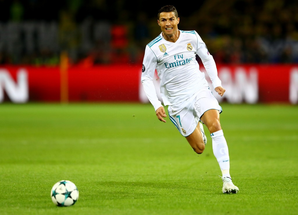 DORTMUND, GERMANY - SEPTEMBER 26: Cristiano Ronaldo of Real Madrid runs with the ball during the UEFA Champions League group H match between Borussia Dortmund and Real Madrid at Signal Iduna Park on September 26, 2017 in Dortmund, Germany. (Photo by Martin Rose/Bongarts/Getty Images)