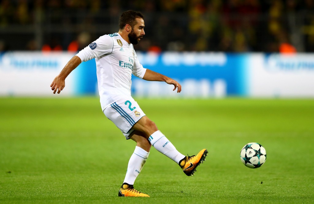 DORTMUND, GERMANY - SEPTEMBER 26: Dani Carvajal of Real Madrid runs with the ball during the UEFA Champions League group H match between Borussia Dortmund and Real Madrid at Signal Iduna Park on September 26, 2017 in Dortmund, Germany. (Photo by Martin Rose/Bongarts/Getty Images)