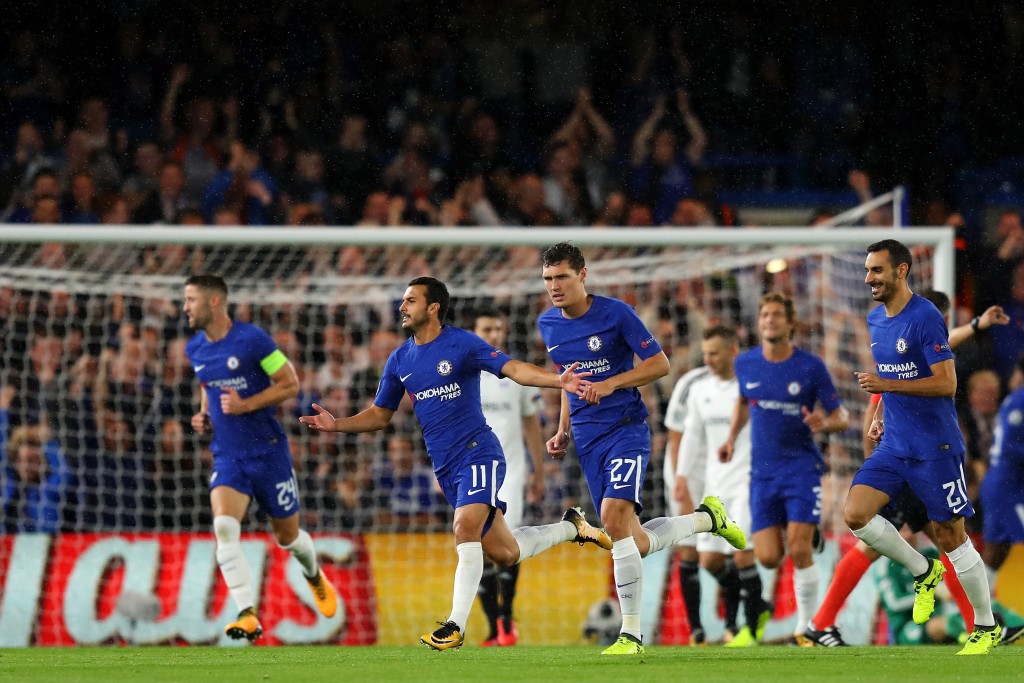 LONDON, ENGLAND - SEPTEMBER 12: Pedro of Chelsea celebrates scoring his sides first goal with his Chelsea team mates during the UEFA Champions League Group C match between Chelsea FC and Qarabag FK at Stamford Bridge on September 12, 2017 in London, United Kingdom. (Photo by Richard Heathcote/Getty Images)