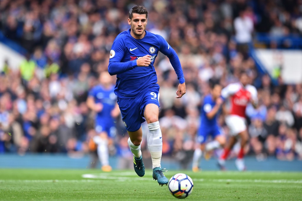 Chelsea's Spanish striker Alvaro Morata runs with the ball during the English Premier League football match between Chelsea and Arsenal at Stamford Bridge in London on September 17, 2017. / AFP PHOTO / Glyn KIRK / RESTRICTED TO EDITORIAL USE. No use with unauthorized audio, video, data, fixture lists, club/league logos or 'live' services. Online in-match use limited to 75 images, no video emulation. No use in betting, games or single club/league/player publications. / (Photo credit should read GLYN KIRK/AFP/Getty Images)