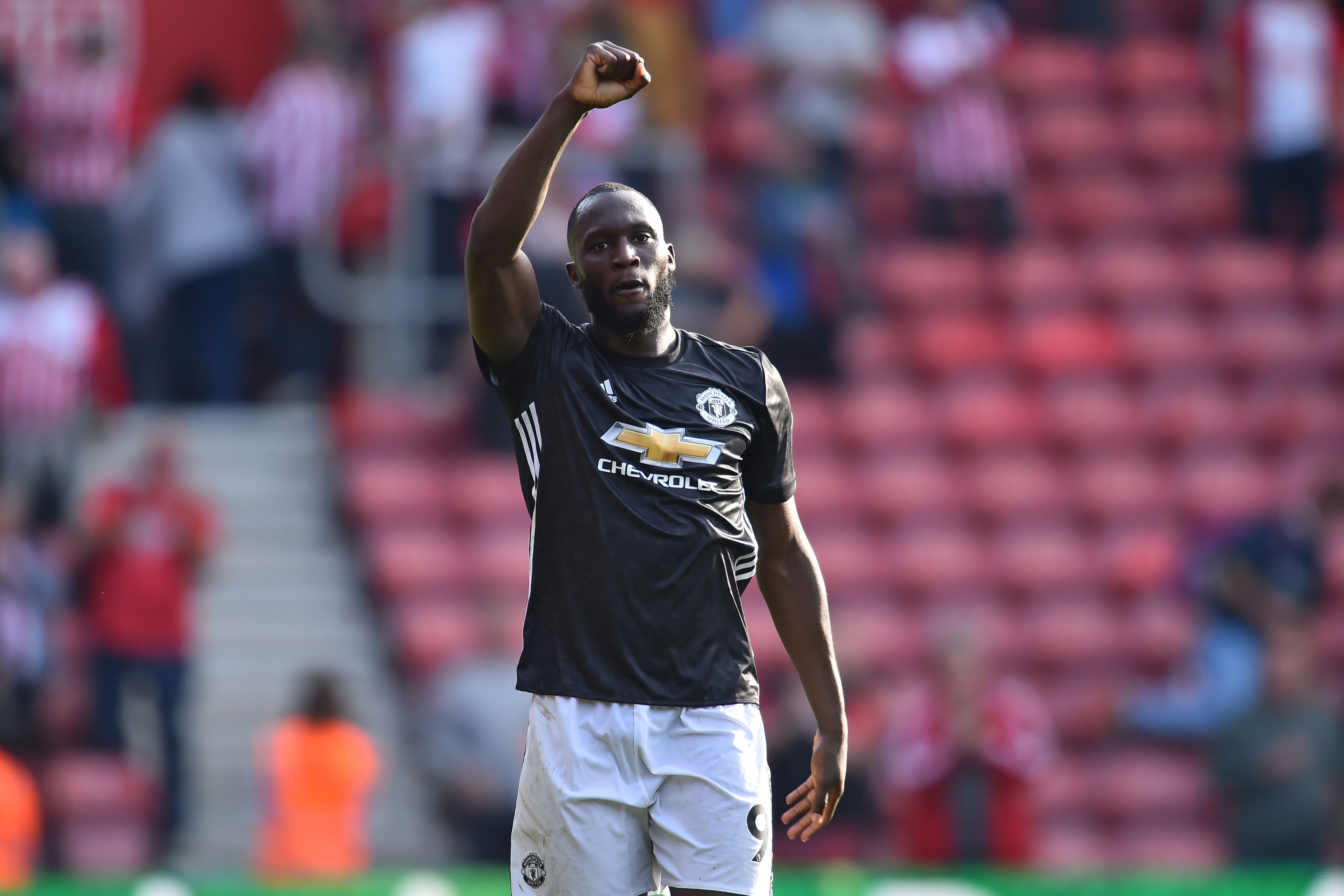Manchester United's Belgian striker Romelu Lukaku gestures on the pitch after the English Premier League football match between Southampton and Manchester United at St Mary's Stadium in Southampton, southern England on September 23, 2017.
Manchester United won the game 1-0. / AFP PHOTO / Glyn KIRK / RESTRICTED TO EDITORIAL USE. No use with unauthorized audio, video, data, fixture lists, club/league logos or 'live' services. Online in-match use limited to 75 images, no video emulation. No use in betting, games or single club/league/player publications. / (Photo credit should read GLYN KIRK/AFP/Getty Images)