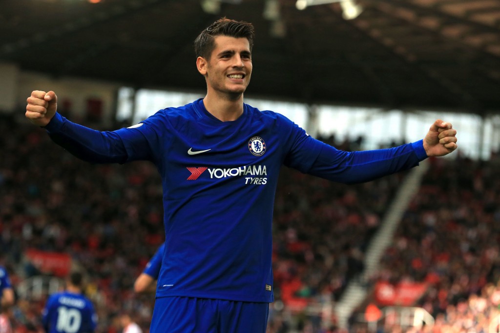 Chelsea's Spanish striker Alvaro Morata celebrates scoring their third goal during the English Premier League football match between Stoke City and Chelsea at the Bet365 Stadium in Stoke-on-Trent, central England on September 23, 2017. / AFP PHOTO / Lindsey PARNABY / RESTRICTED TO EDITORIAL USE. No use with unauthorized audio, video, data, fixture lists, club/league logos or 'live' services. Online in-match use limited to 75 images, no video emulation. No use in betting, games or single club/league/player publications. / (Photo credit should read LINDSEY PARNABY/AFP/Getty Images)