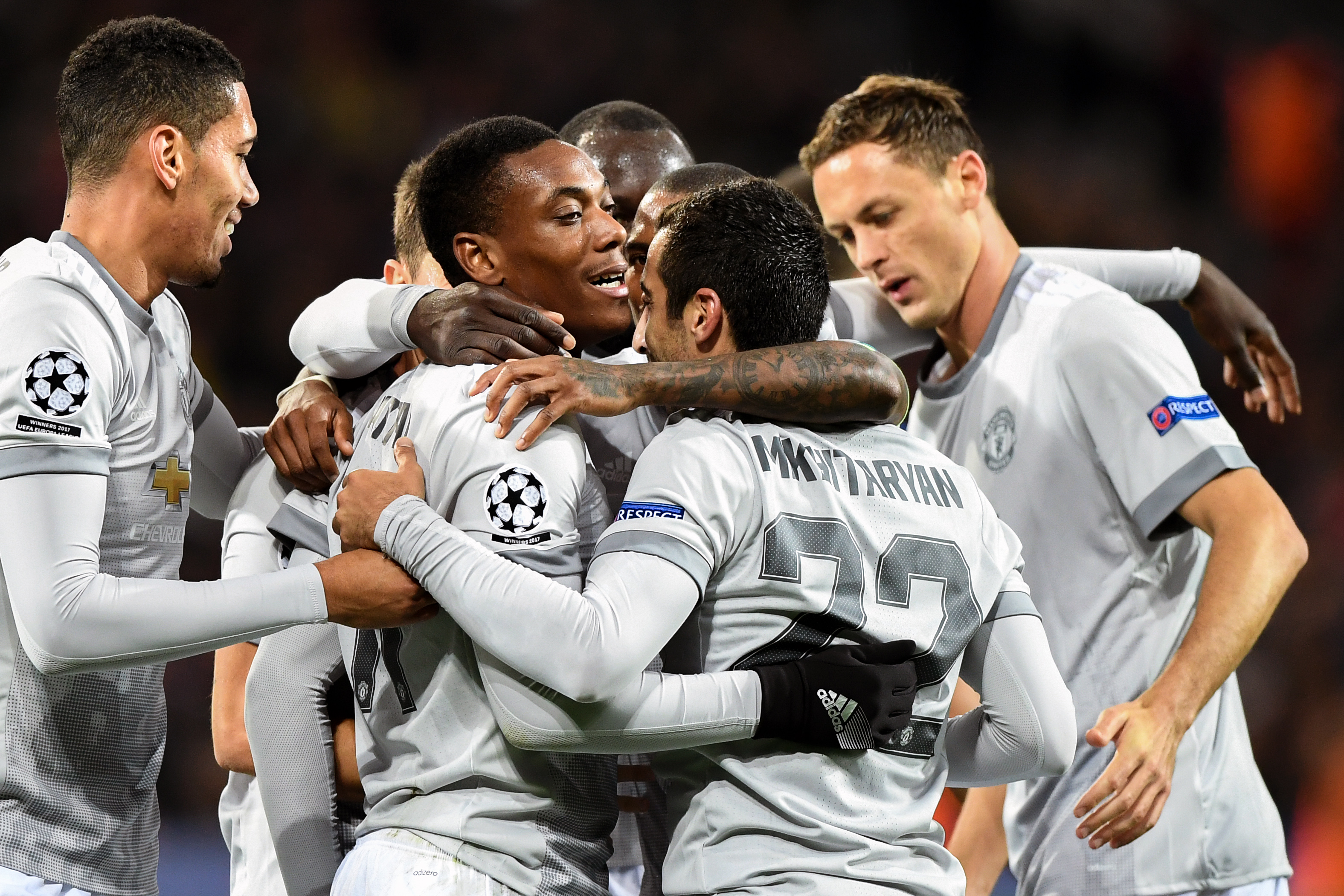 Manchester United's midfielder from Armenia Henrikh Mkhitaryan celebrates with teammates after scoring the team's fourth goal during the UEFA Champions League Group A football match between PFC CSKA Moscow and Manchester United FC in Moscow on September 27, 2017. / AFP PHOTO / Yuri KADOBNOV (Photo credit should read YURI KADOBNOV/AFP/Getty Images)