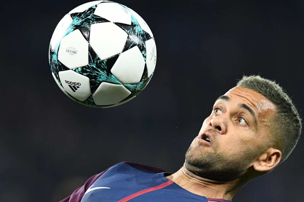 Paris Saint-Germain's Brazilian defender Dani Alves controls the ball during the UEFA Champions League football match between Paris Saint-Germain and Bayern Munich on September 27, 2017 at the Parc des Princes stadium in Paris. / AFP PHOTO / FRANCK FIFE (Photo credit should read FRANCK FIFE/AFP/Getty Images)