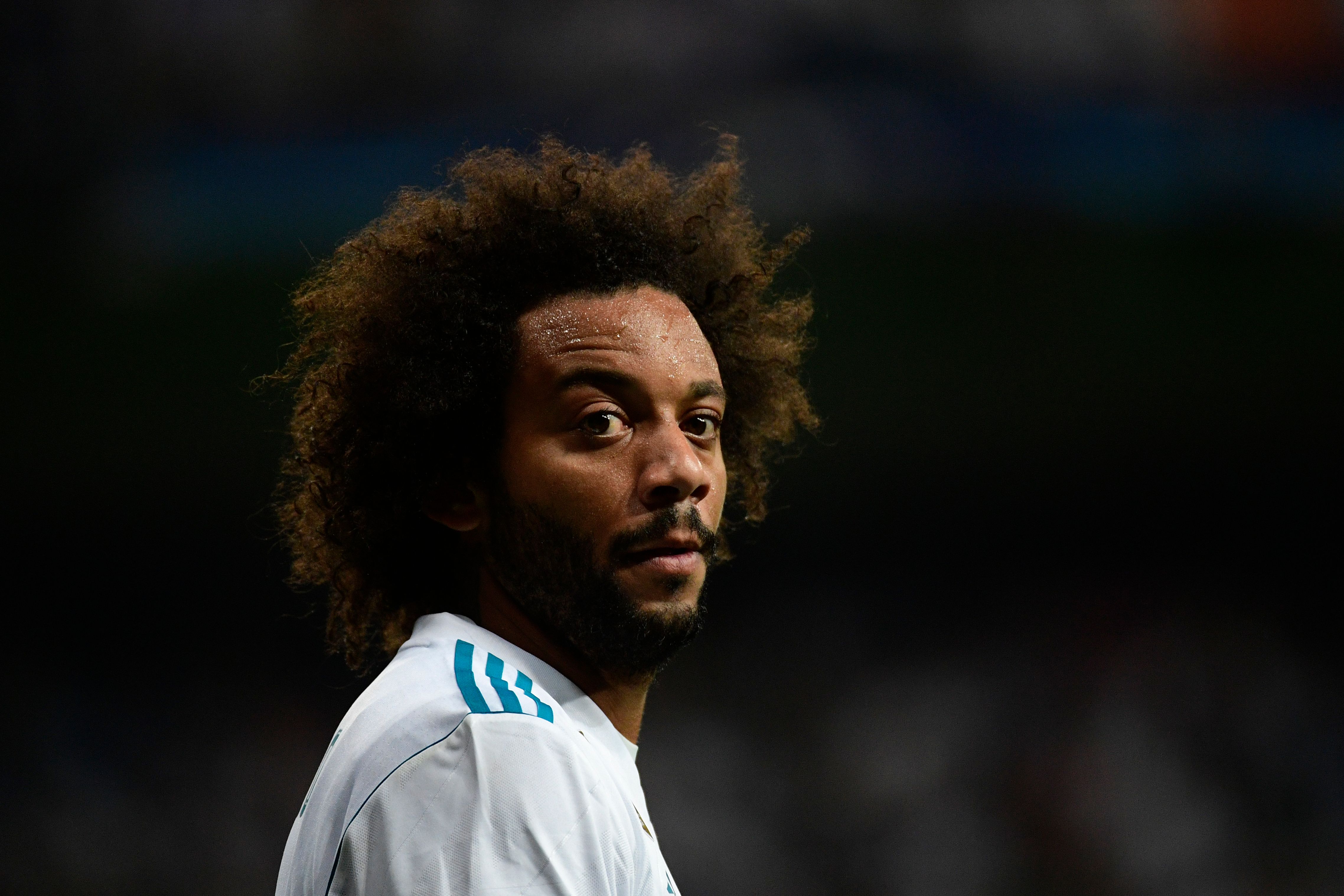 Real Madrid's defender from Brazil Marcelo looks on during the UEFA Champions League football match Real Madrid CF vs APOEL FC at the Santiago Bernabeu stadium in Madrid on September 13, 2017. / AFP PHOTO / PIERRE-PHILIPPE MARCOU (Photo credit should read PIERRE-PHILIPPE MARCOU/AFP/Getty Images)