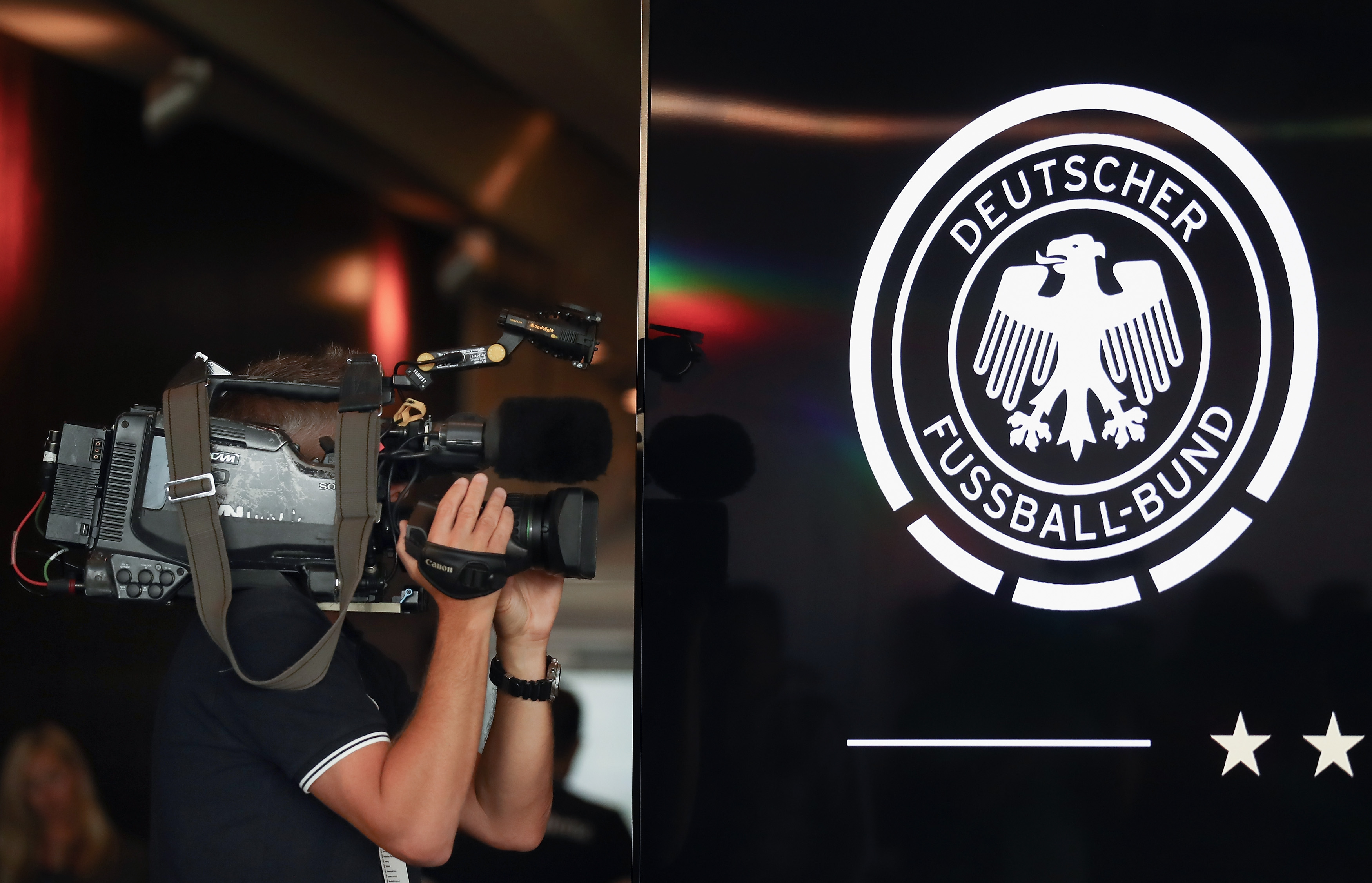 STUTTGART, GERMANY - SEPTEMBER 03: A camera man works during a Germany press conference at Mercedes-Benz-Museum ahead of their FIFA World Cup Russia 2018 Group C Qualifier against Norway on September 3, 2017 in Stuttgart, Germany. (Photo by Alexander Hassenstein/Bongarts/Getty Images)