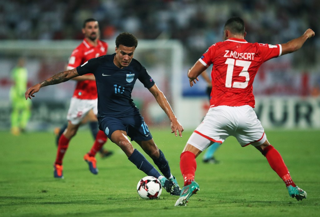VALLETTA, MALTA - SEPTEMBER 01: Dele Alli of England is faced by Zach Muscat of Malta during the FIFA 2018 World Cup Qualifier between Malta and England at Ta'Qali National Stadium on September 1, 2017 in Valletta, Malta. (Photo by Julian Finney/Getty Images)