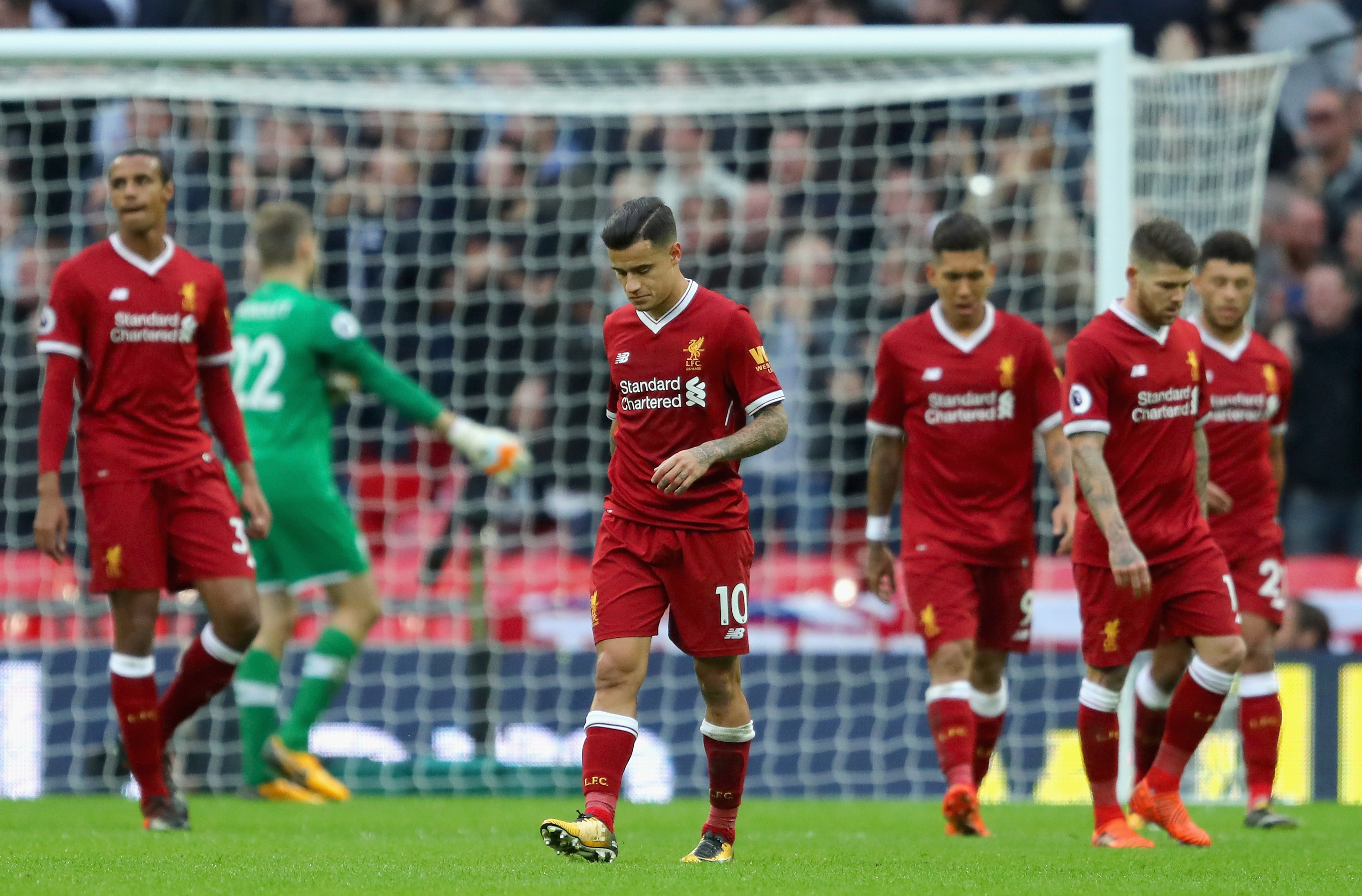 LONDON, ENGLAND - OCTOBER 22: Philippe Coutinho of Liverpool and his Liverpool team mates are dejected after Tottenham Hotspur fourth goal during the Premier League match between Tottenham Hotspur and Liverpool at Wembley Stadium on October 22, 2017 in London, England.  (Photo by Richard Heathcote/Getty Images)