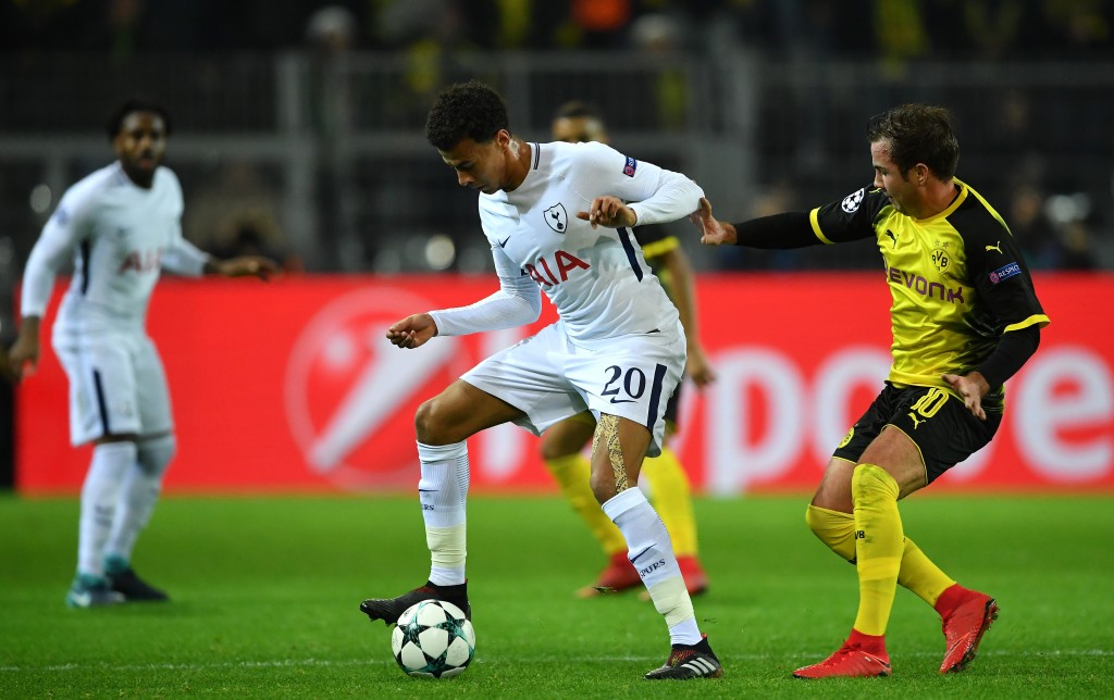 DORTMUND, GERMANY - NOVEMBER 21: Dele Alli of Tottenham Hotspur and Mario Gotze of Borussia Dortmund in action during the UEFA Champions League group H match between Borussia Dortmund and Tottenham Hotspur at Signal Iduna Park on November 21, 2017 in Dortmund, Germany. (Photo by Stuart Franklin/Getty Images)