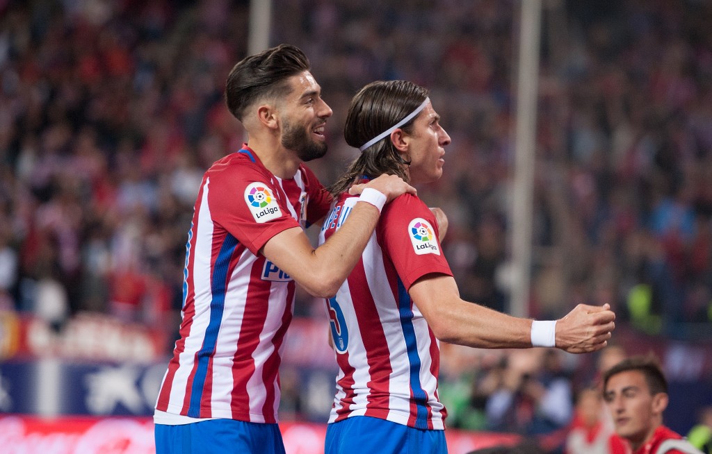 MADRID, SPAIN - APRIL 04: Felipe Luis of Club Atletico de Madrid celebrates with Yannick Carrasco after scoring his team's 1st goal during the La Liga match between Club Atletico de Madrid and Real Sociedad de Futbol at Vicente Calderon Stadium on April 4, 2017 in Madrid, Spain. (Photo by Denis Doyle/Getty Images)