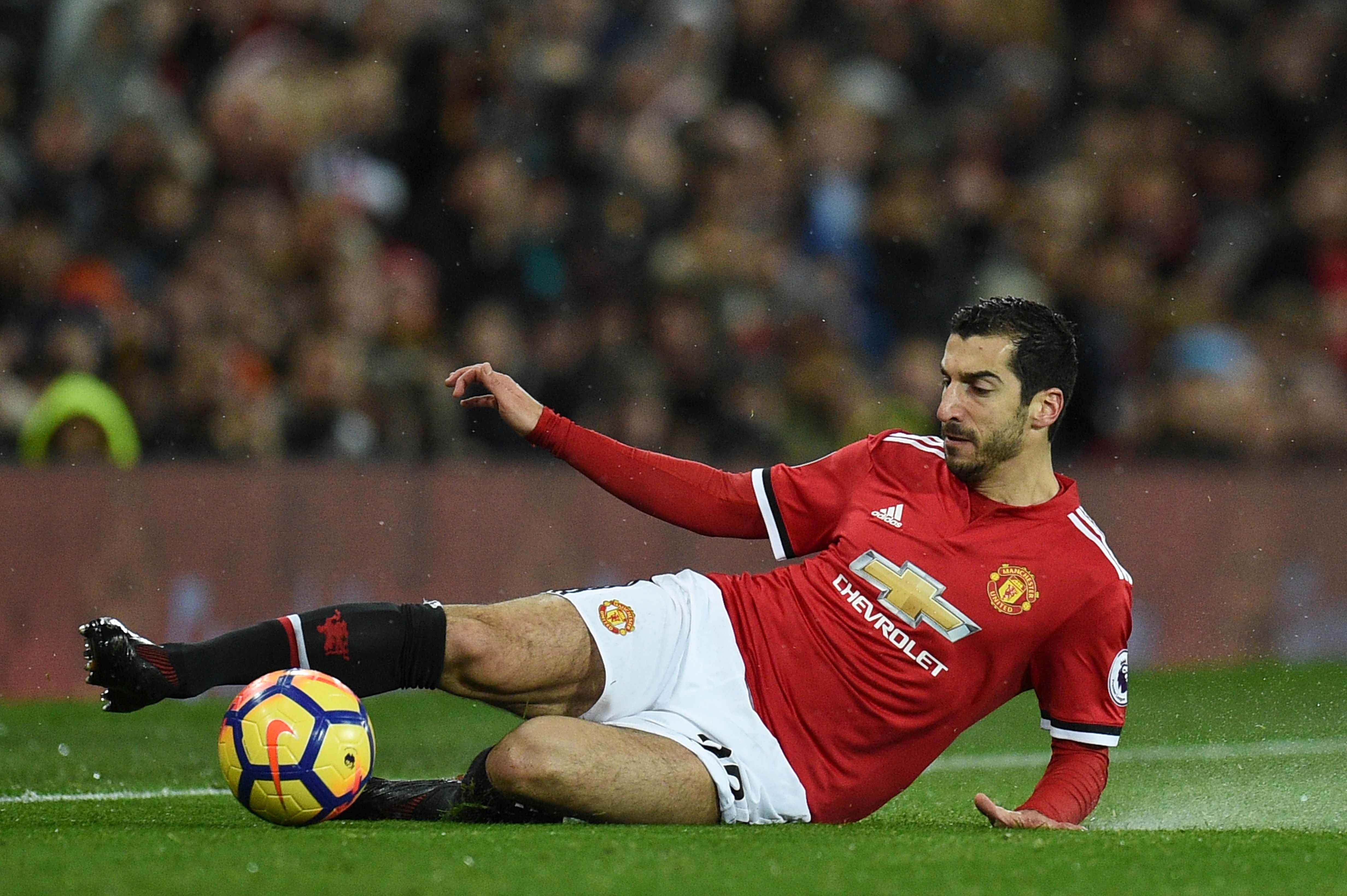 Manchester United's Armenian midfielder Henrikh Mkhitaryan controls the ball during the English Premier League football match between Manchester United and Brighton and Hove Albion at Old Trafford in Manchester, north west England, on November 25, 2017. / AFP PHOTO / Oli SCARFF / RESTRICTED TO EDITORIAL USE. No use with unauthorized audio, video, data, fixture lists, club/league logos or 'live' services. Online in-match use limited to 75 images, no video emulation. No use in betting, games or single club/league/player publications. / (Photo credit should read OLI SCARFF/AFP/Getty Images)
