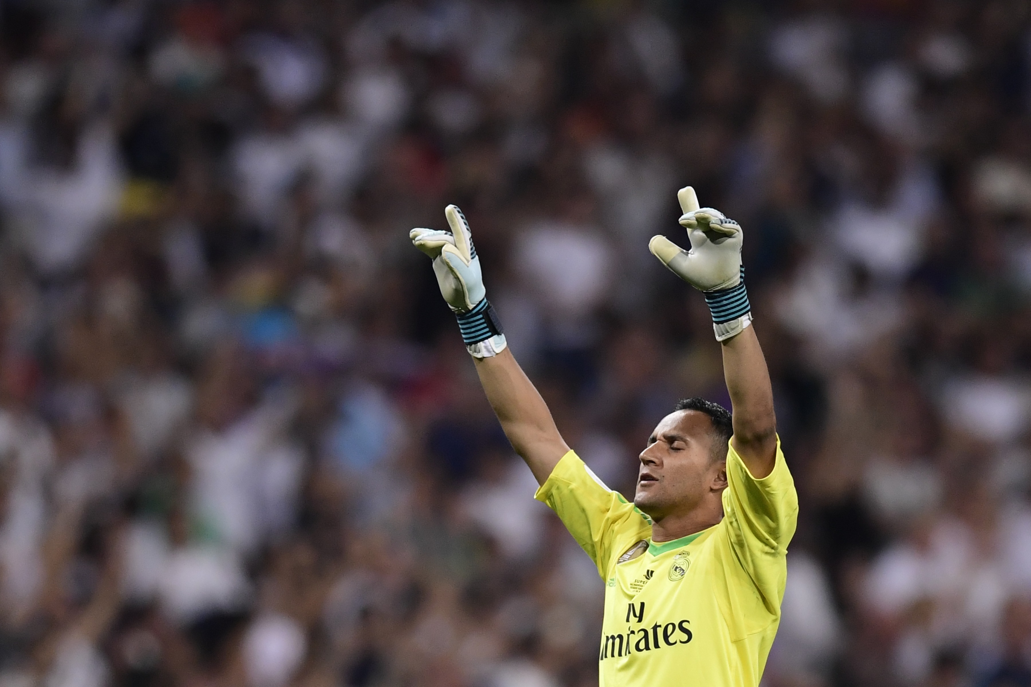 Real Madrid's Costa Rican goalkeeper Keylor Navas celebrates their second goal during the second leg of the Spanish Supercup football match Real Madrid vs FC Barcelona at the Santiago Bernabeu stadium in Madrid, on August 16, 2017. / AFP PHOTO / JAVIER SORIANO        (Photo credit should read JAVIER SORIANO/AFP/Getty Images)