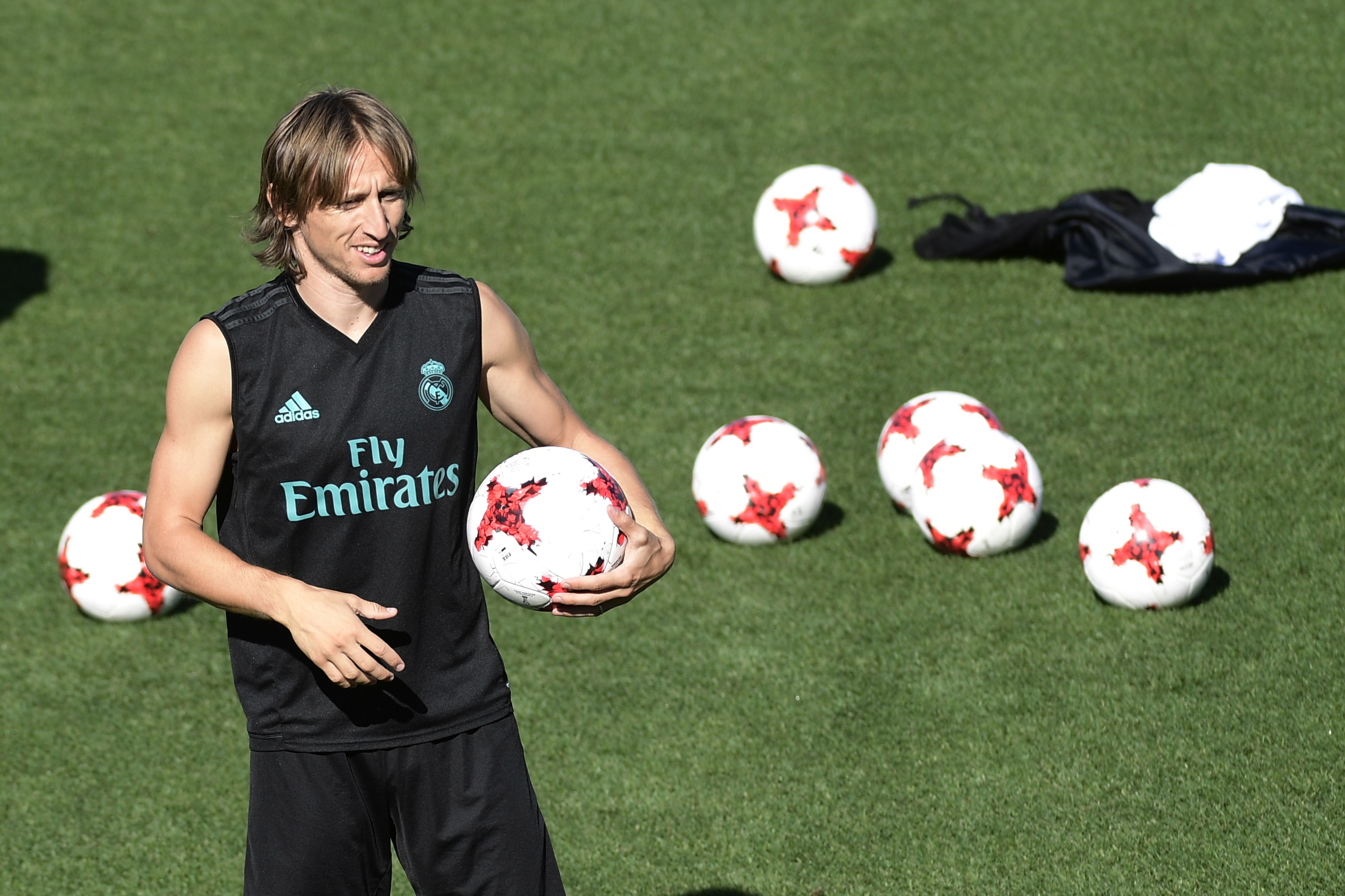 Real Madrid's Croatian midfielder Luka Modric takes part in a training session at Real Madrid sport city in Madrid on August 12, 2017, on the eve of the Spanish SuperCup first leg football match Real Madrid CF vs FC Barcelona. / AFP PHOTO / JAVIER SORIANO (Photo credit should read JAVIER SORIANO/AFP/Getty Images)