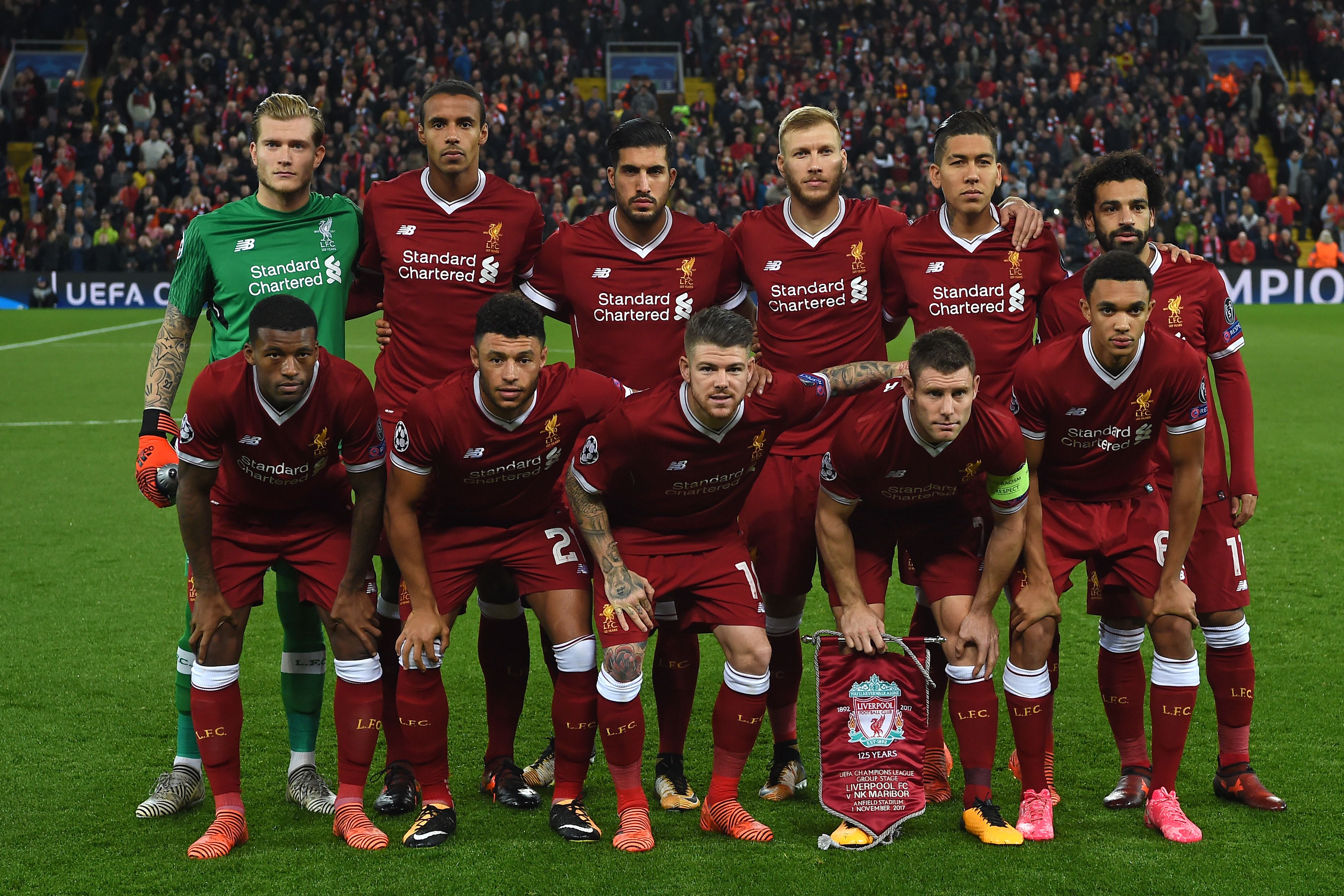 Liverpool players (back row L-R) Liverpool's German goalkeeper Loris Karius, Liverpool's German-born Cameroonian defender Joel Matip, Liverpool's German midfielder Emre Can, Liverpool's Estonian defender Ragnar Klavan, Liverpool's Brazilian midfielder Roberto Firmino and Liverpool's Egyptian midfielder Mohamed Salah , (front row L-R) Liverpool's Dutch midfielder Georginio Wijnaldum, Liverpool's English midfielder Alex Oxlade-Chamberlain, Liverpool's Spanish defender Alberto Moreno, Liverpool's English midfielder James Milner and Liverpool's English midfielder Trent Alexander-Arnold pose for a group photograph ahead of the UEFA Champions League Group E football match between Liverpool and NK Maribor at Anfield in Liverpool, north-west England on November 1, 2017. / AFP PHOTO / Paul ELLIS (Photo credit should read PAUL ELLIS/AFP/Getty Images)