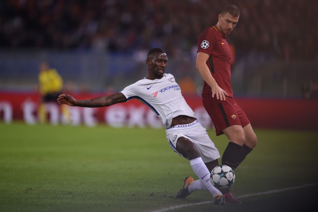 Roma's Bosnian striker Edin Dzeko (R) fights for the ball with Chelsea's German defender Antonio Rudiger during the UEFA Champions League football match AS Roma vs Chelsea on October 31, 2017 at the Olympic Stadium in Rome. / AFP PHOTO / Filippo MONTEFORTE (Photo credit should read FILIPPO MONTEFORTE/AFP/Getty Images)