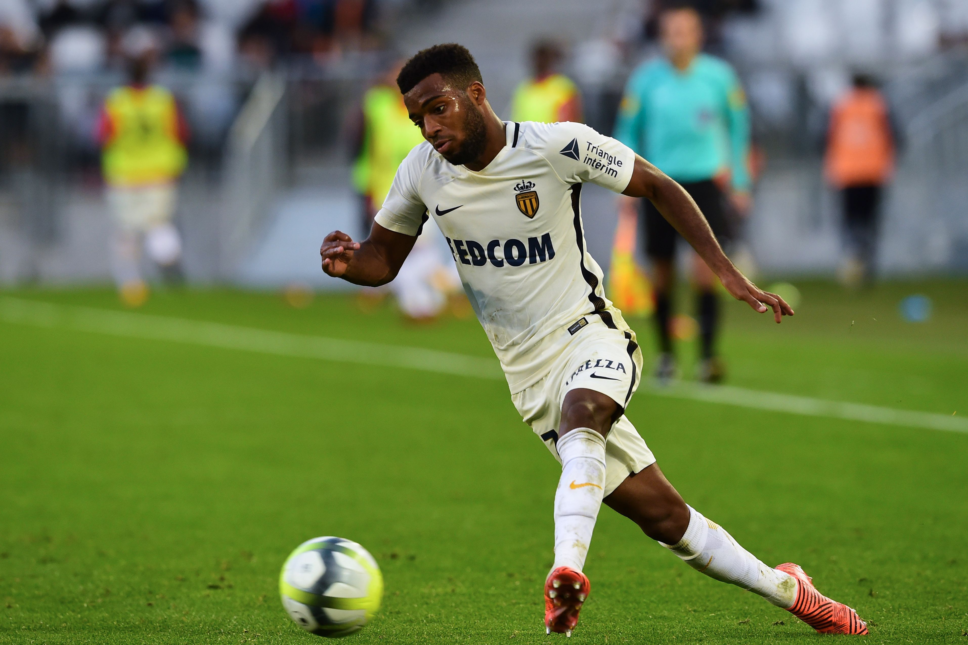 Monaco's French midfielder Thomas Lemar runs with the ball during the French L1 football match between Bordeaux and Monaco on October 28, 2017 at the Matmut Atlantique stadium in Bordeaux, southwestern France. / AFP PHOTO / NICOLAS TUCAT (Photo credit should read NICOLAS TUCAT/AFP/Getty Images)