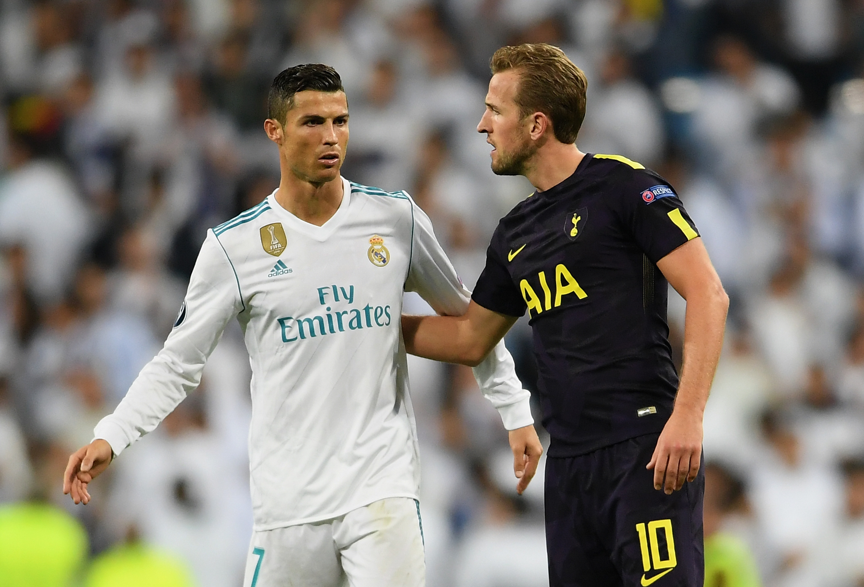 MADRID, SPAIN - OCTOBER 17: Cristiano Ronaldo of Real Madrid and Harry Kane of Tottenham Hotspur speak after the UEFA Champions League group H match between Real Madrid and Tottenham Hotspur at Estadio Santiago Bernabeu on October 17, 2017 in Madrid, Spain. (Photo by Laurence Griffiths/Getty Images)